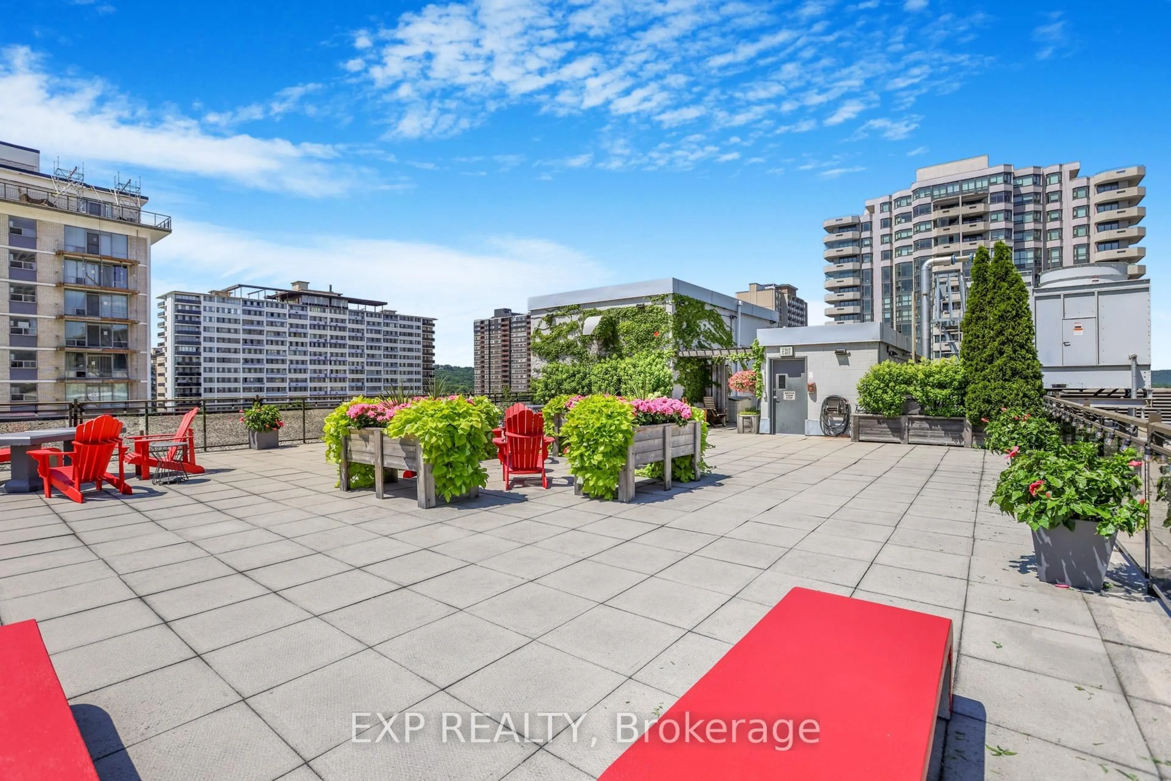 Patio, city buildings view from balcony for 66 Bay St #401, Hamilton Ontario L8P 4Z6