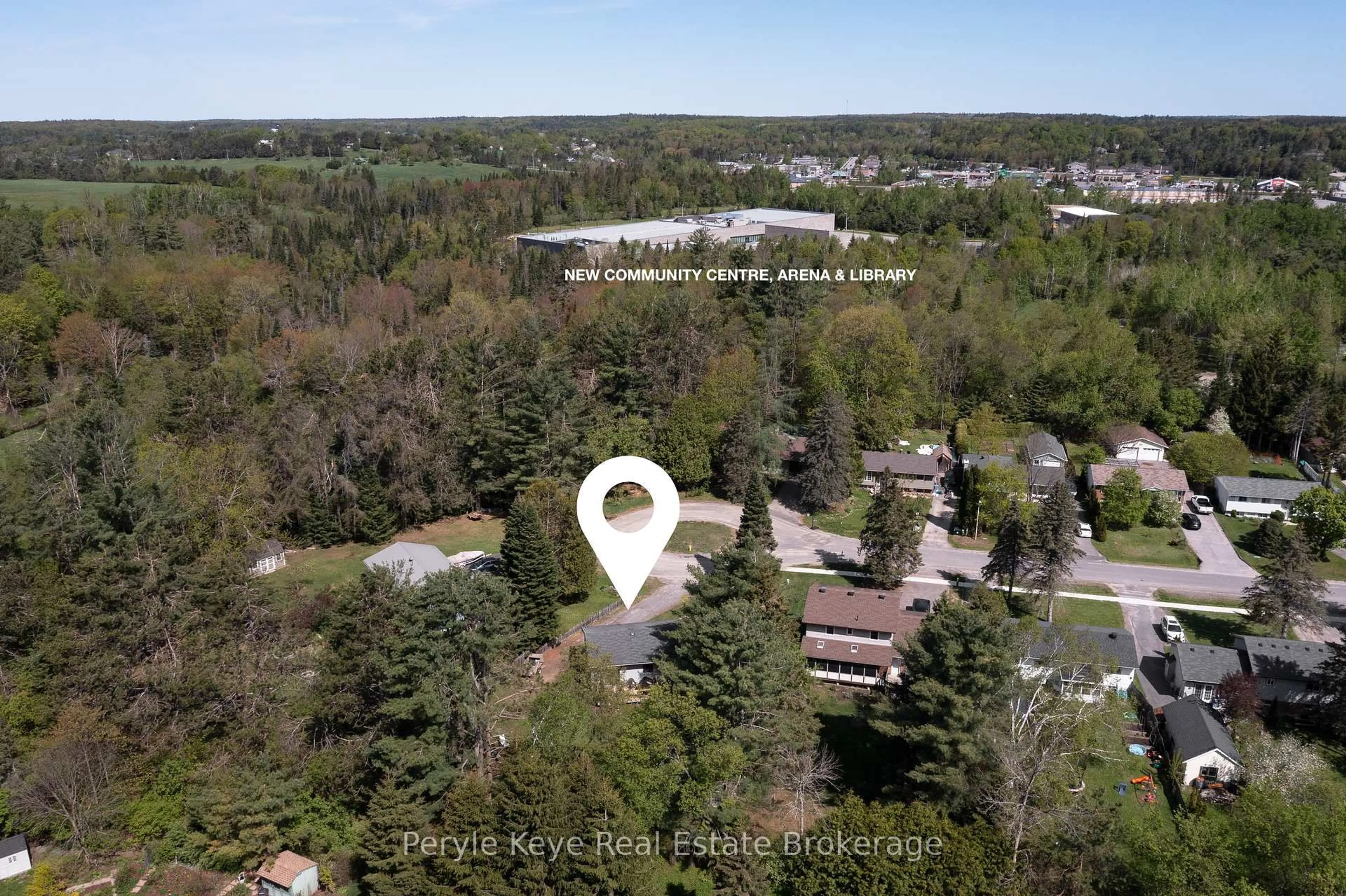 A pic from outside/outdoor area/front of a property/back of a property/a pic from drone, forest/trees view for 38 Andrea Dr, Bracebridge Ontario P1L 1C5