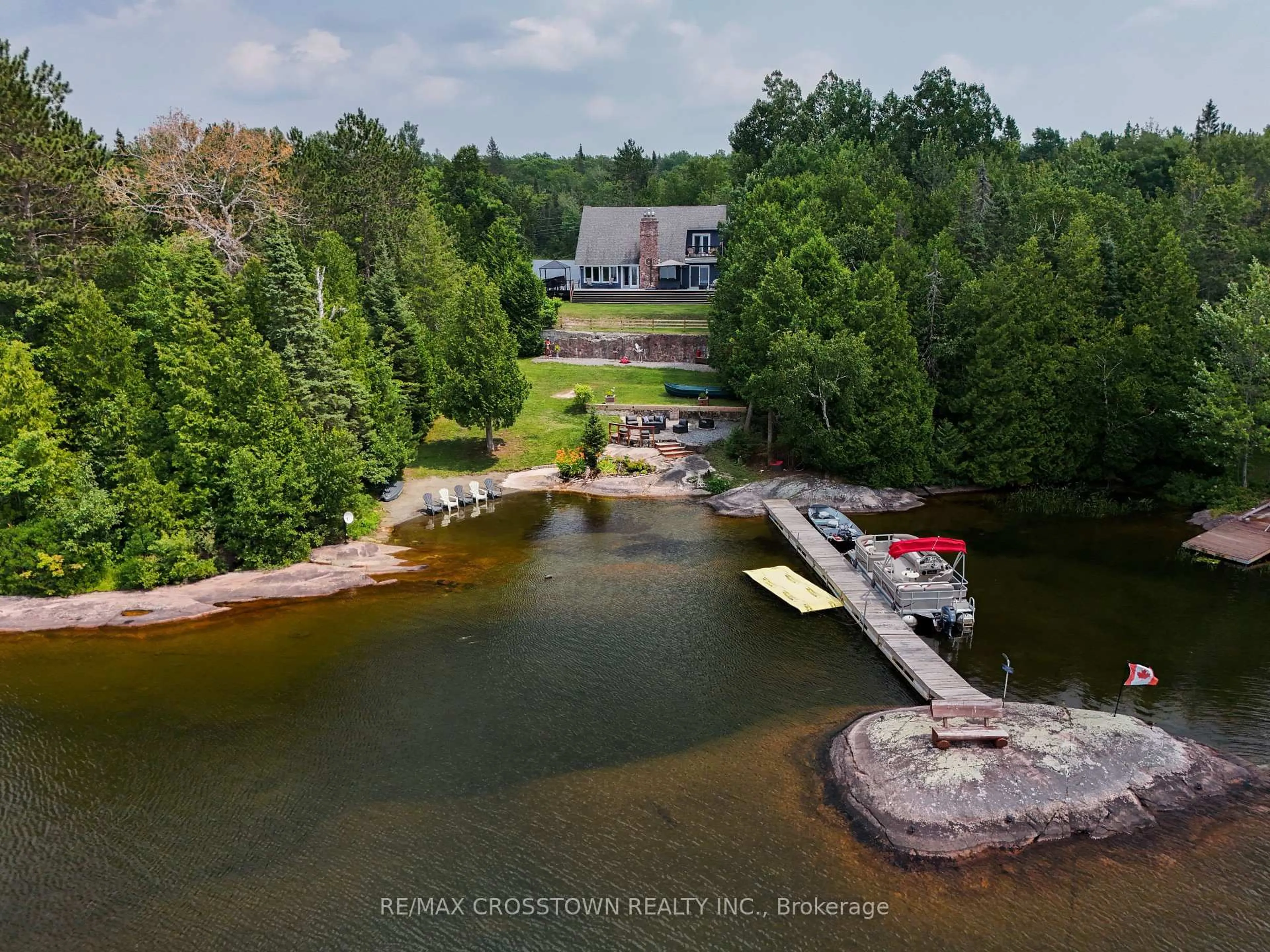 A pic from outside/outdoor area/front of a property/back of a property/a pic from drone, water/lake/river/ocean view for 1111 Lac Clair Rd, West Nipissing Ontario P0H 1M0