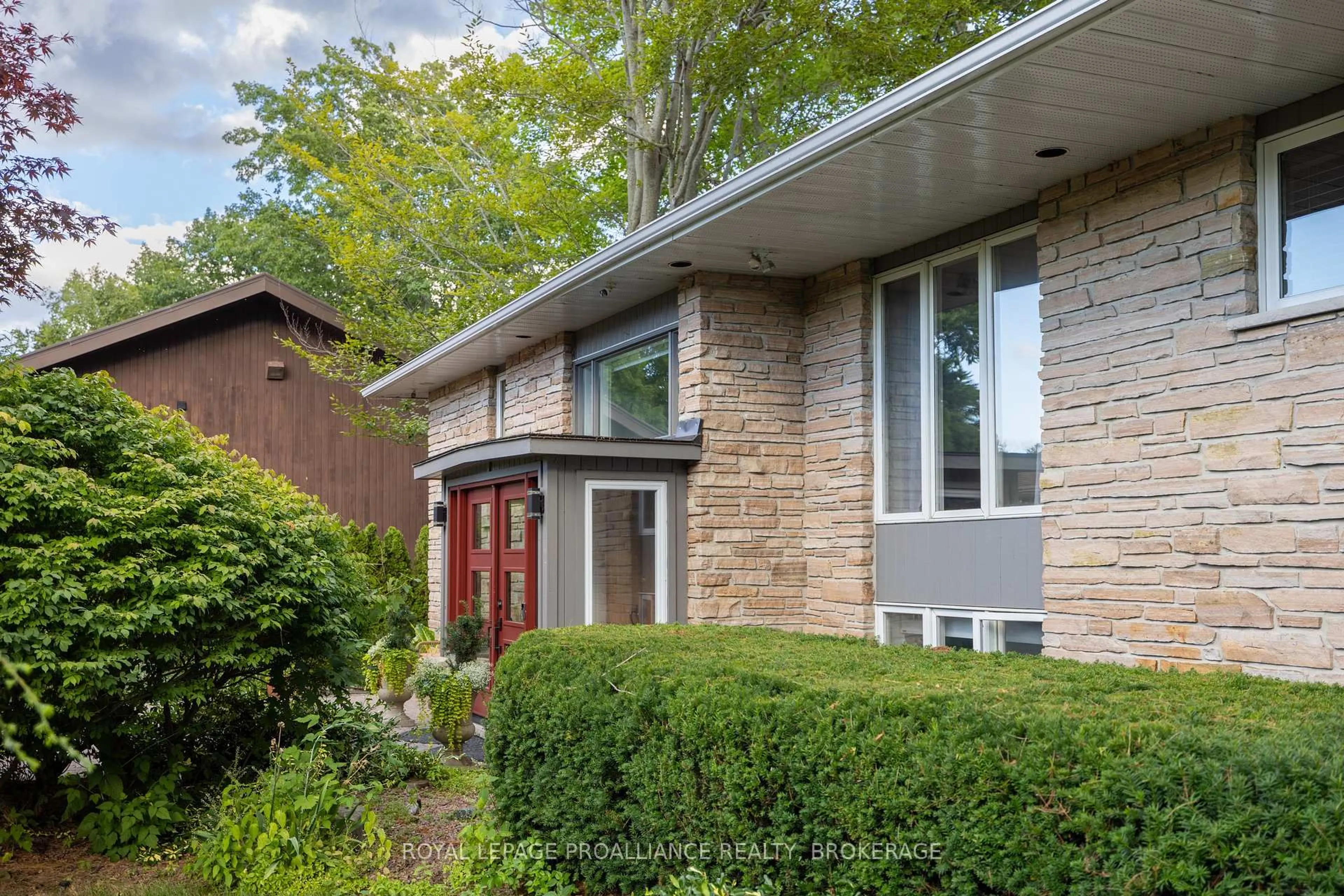 Home with brick exterior material, street for 8 Lakeshore Blvd, Kingston Ontario K7M 4J6