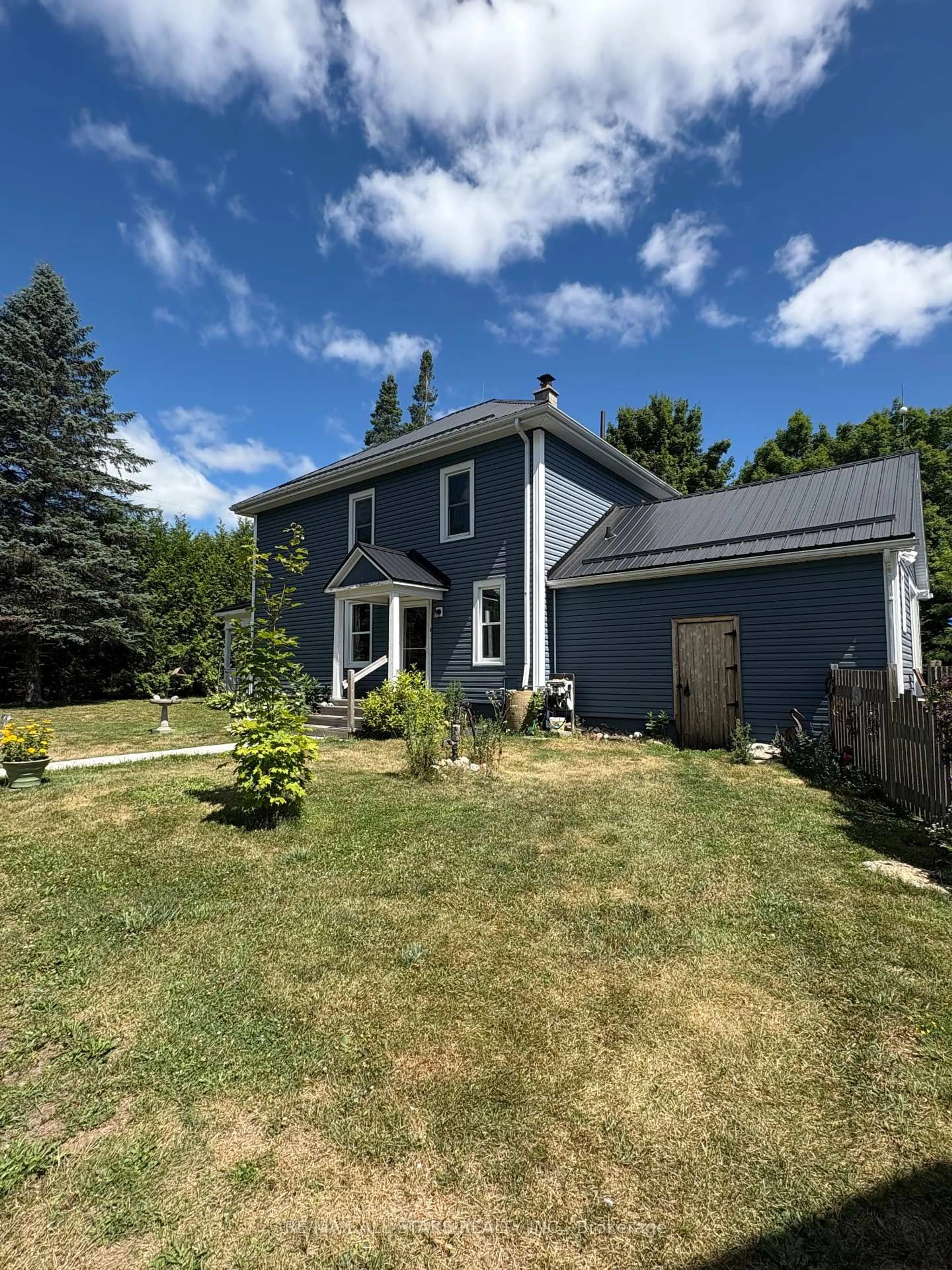 A pic from outside/outdoor area/front of a property/back of a property/a pic from drone, street for 412 Cooper Rd, Madoc Ontario K0K 2K0