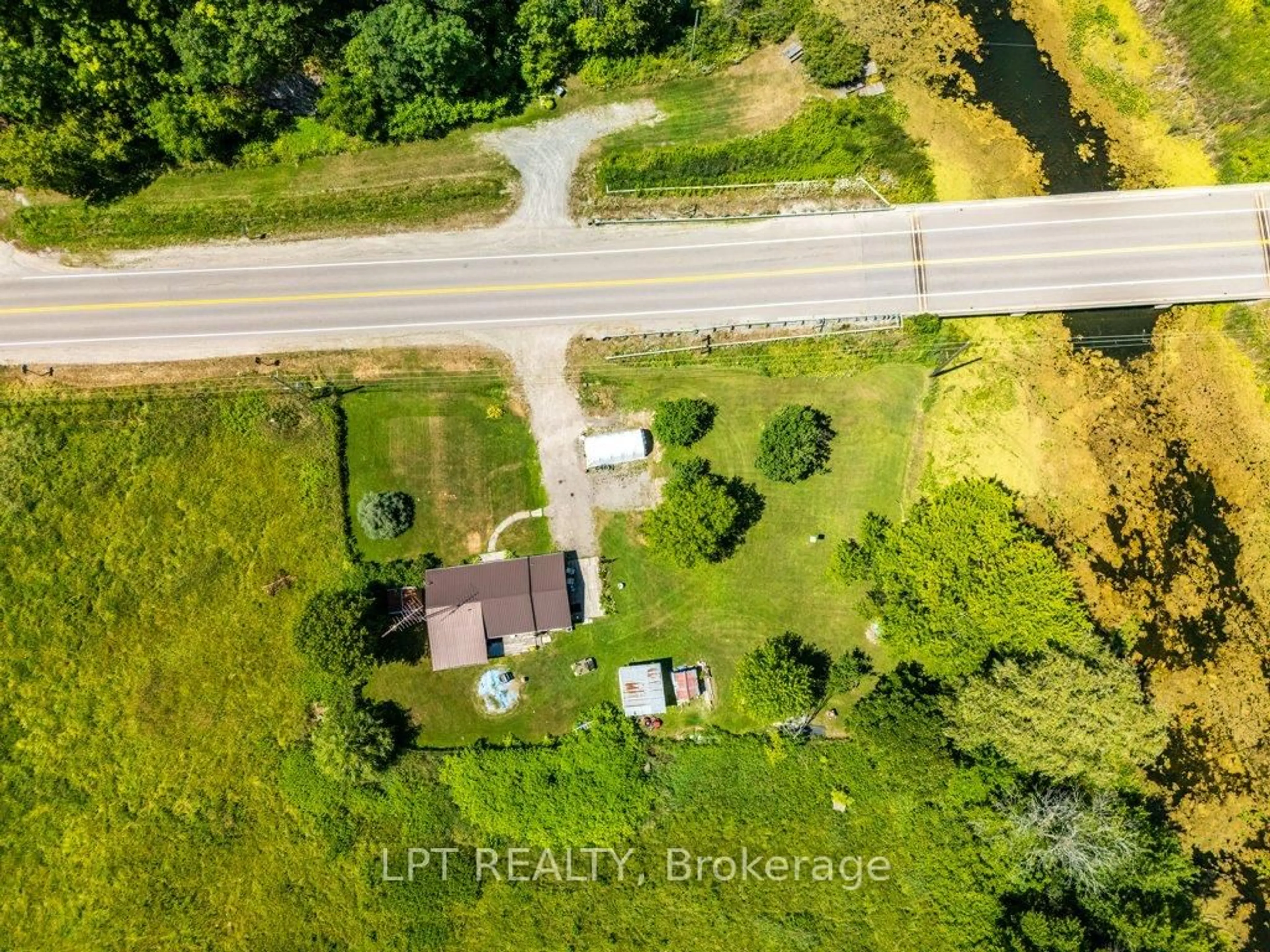 A pic from outside/outdoor area/front of a property/back of a property/a pic from drone, street for 743 Highway 15, Rr#2 Highway, Rideau Lakes Ontario K0E 1N0
