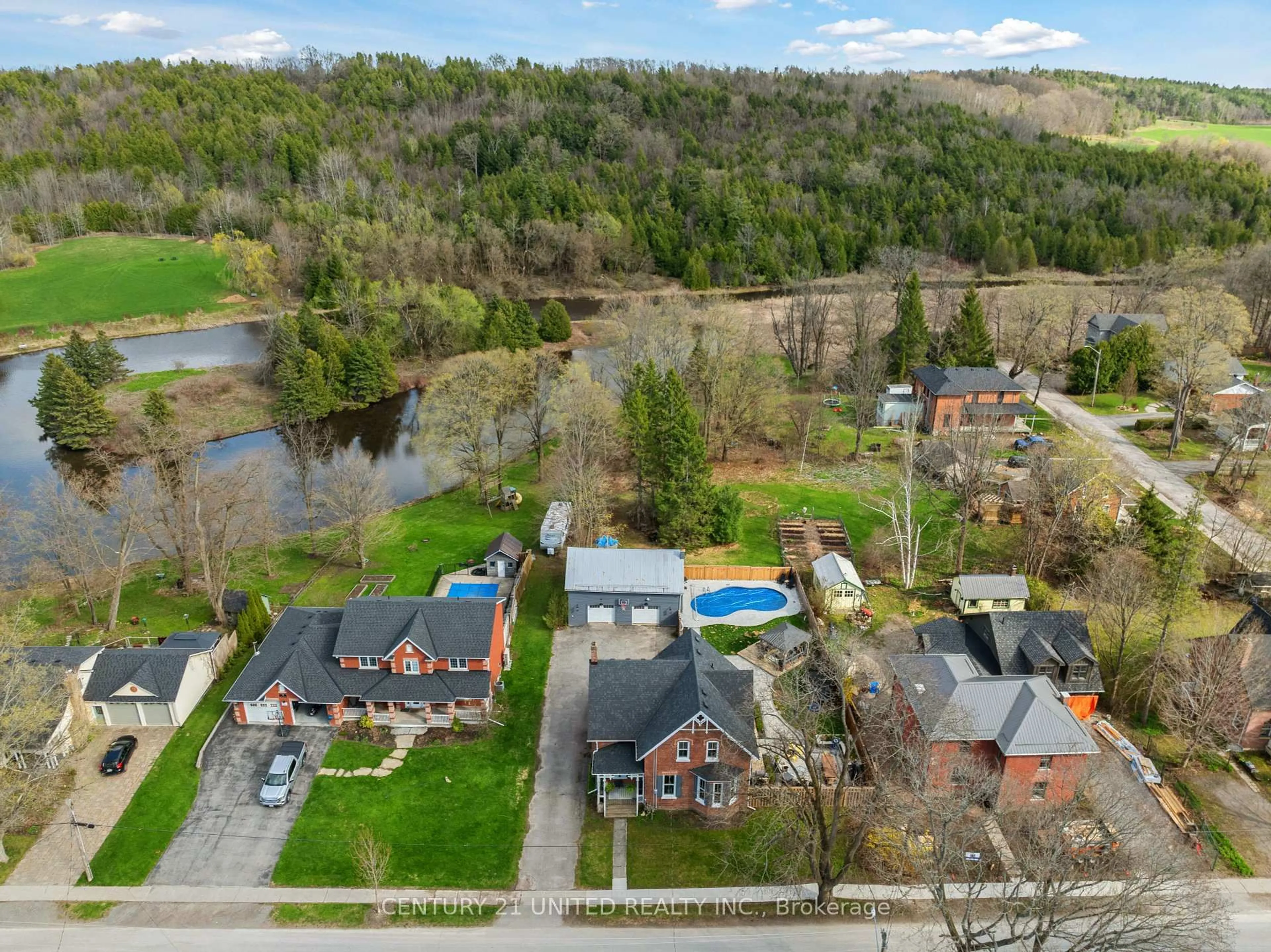 A pic from outside/outdoor area/front of a property/back of a property/a pic from drone, water/lake/river/ocean view for 13 Anne St, Cavan Monaghan Ontario K9J 4S3