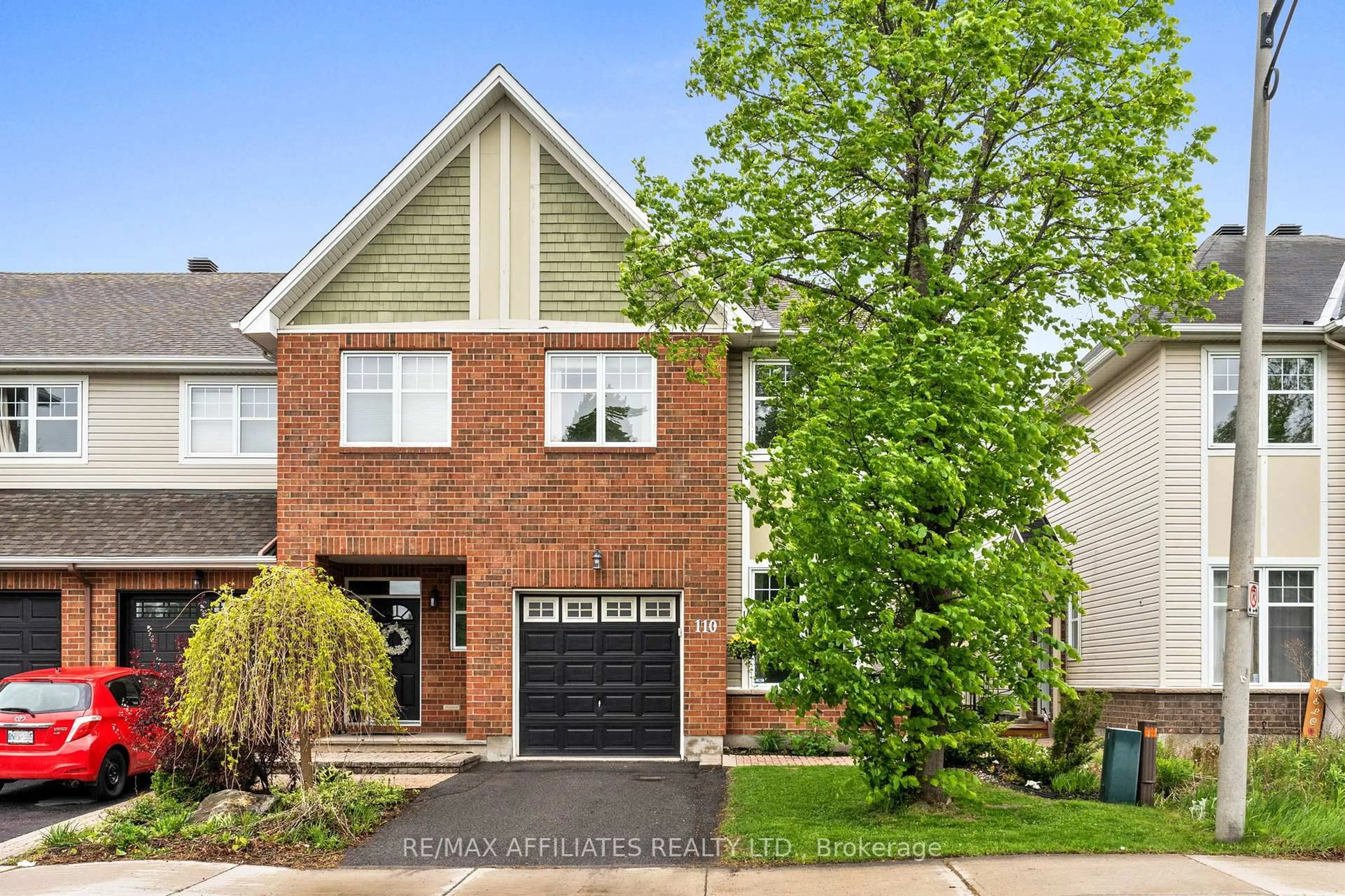Home with brick exterior material, street for 110 Waterbridge Dr, Ottawa Ontario K2G 7C2