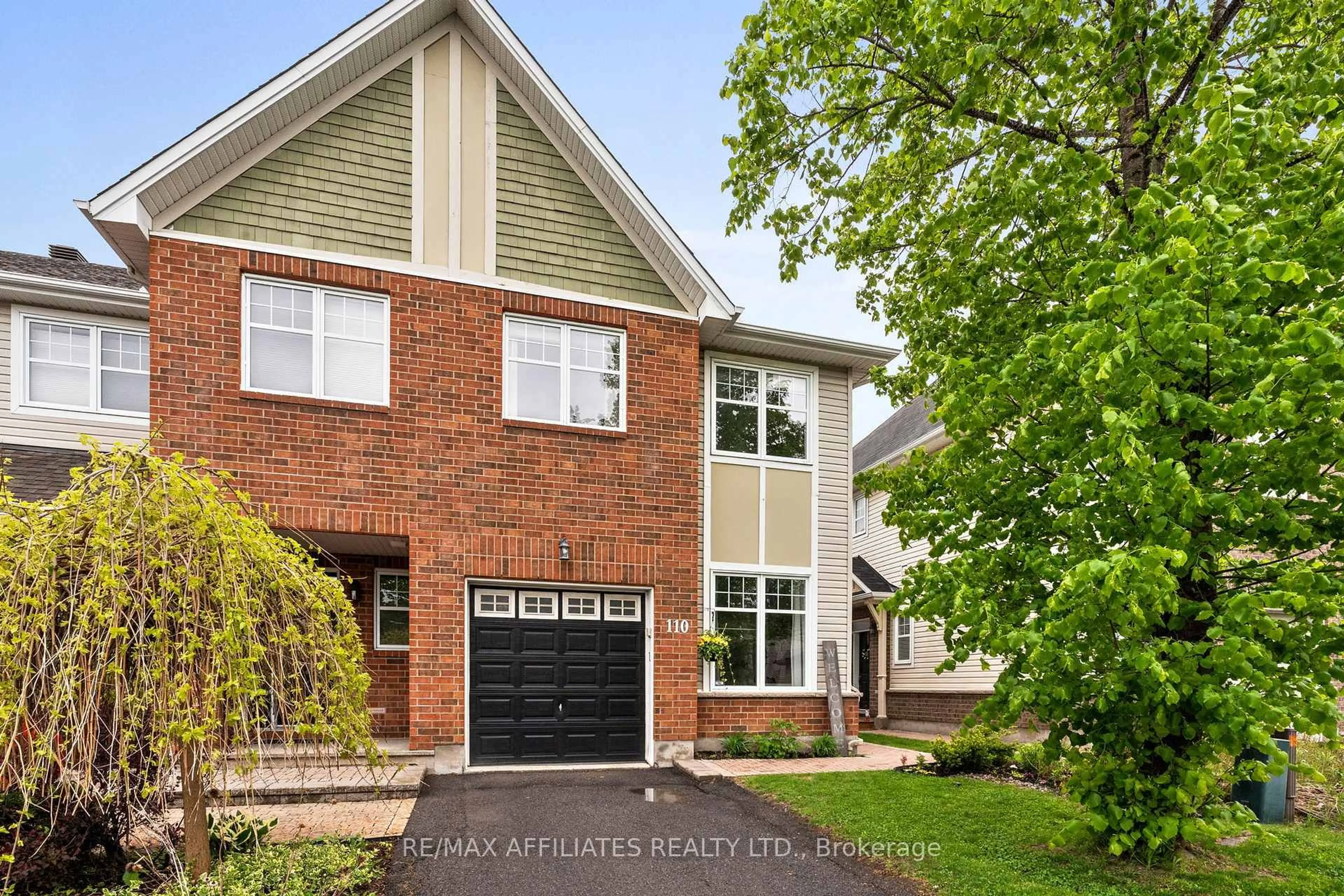 Home with brick exterior material, street for 110 Waterbridge Dr, Ottawa Ontario K2G 7C2