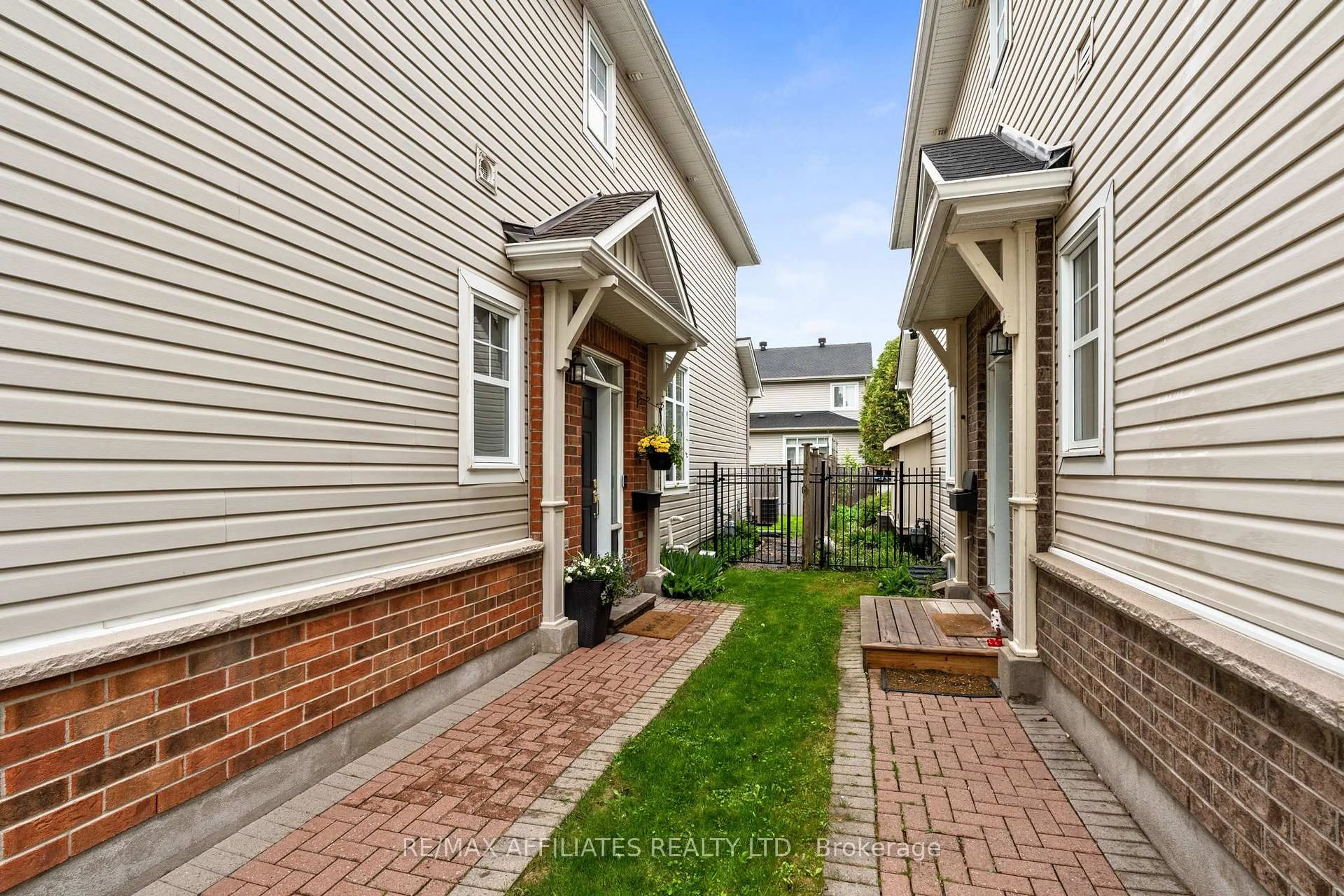 Home with brick exterior material, street for 110 Waterbridge Dr, Ottawa Ontario K2G 7C2