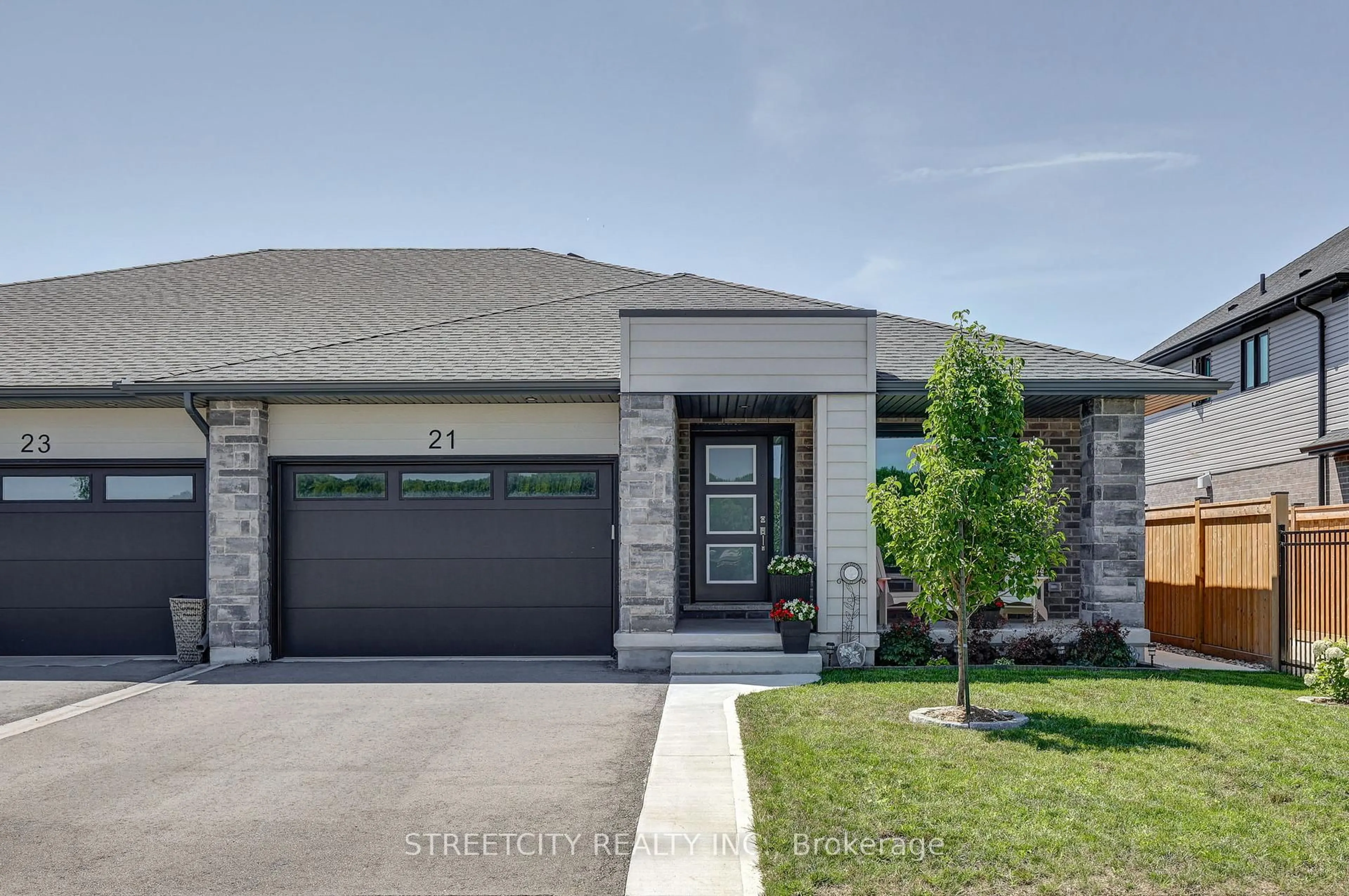 Home with brick exterior material, street for 21 Feathers Crossing, St. Thomas Ontario N5R 0M4