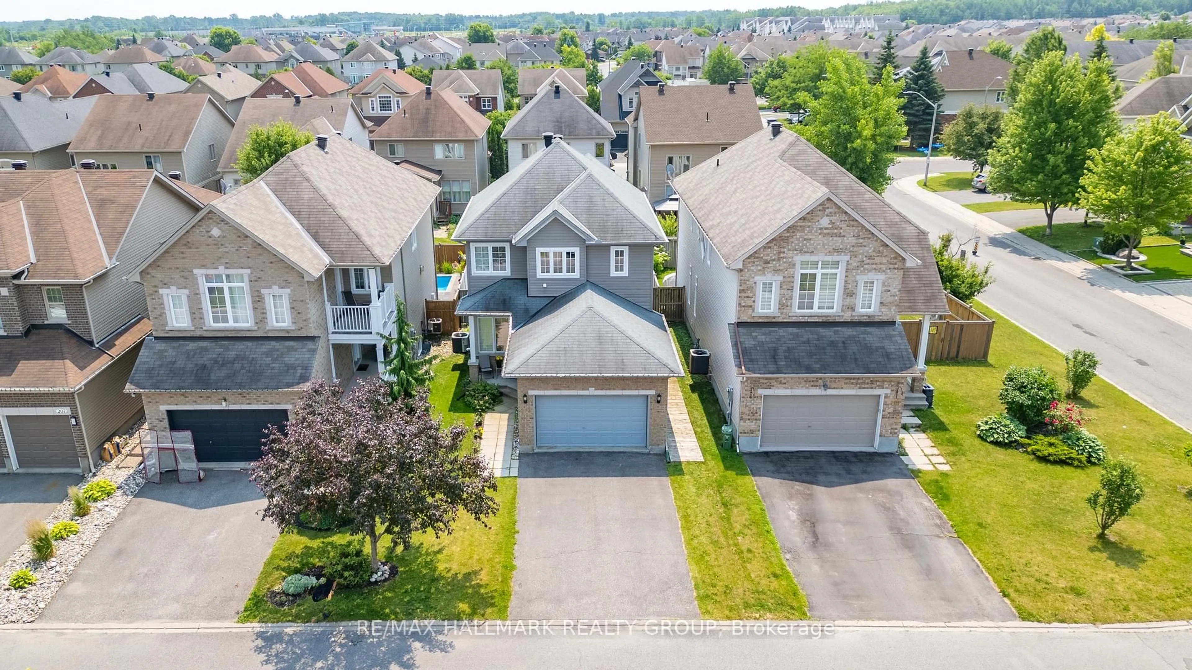 A pic from outside/outdoor area/front of a property/back of a property/a pic from drone, street for 203 Black Sage Cres, Ottawa Ontario K1V 2J7