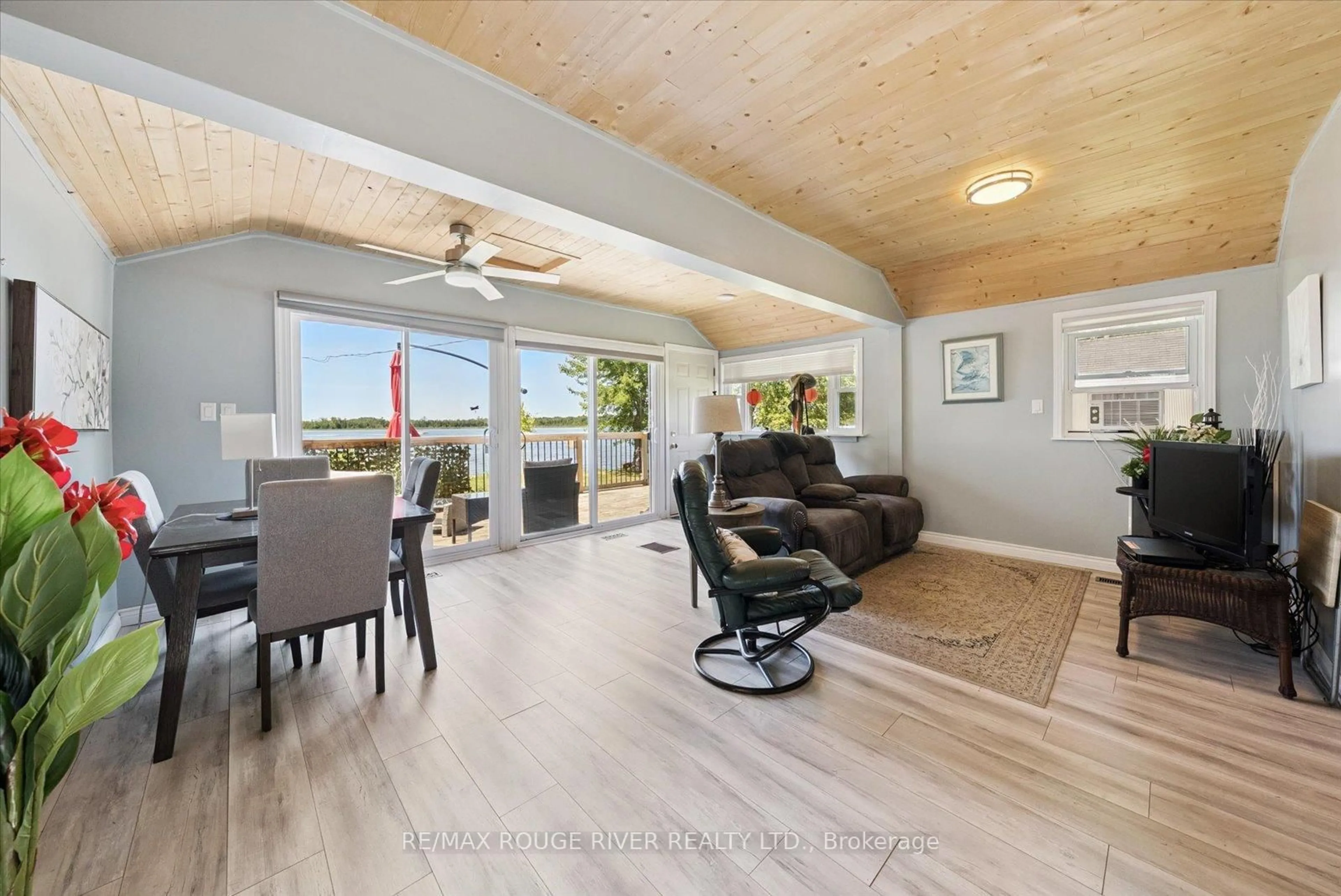 Living room with furniture, wood/laminate floor for 22 Lake Rd #3, Trent Hills Ontario K0L 1L0