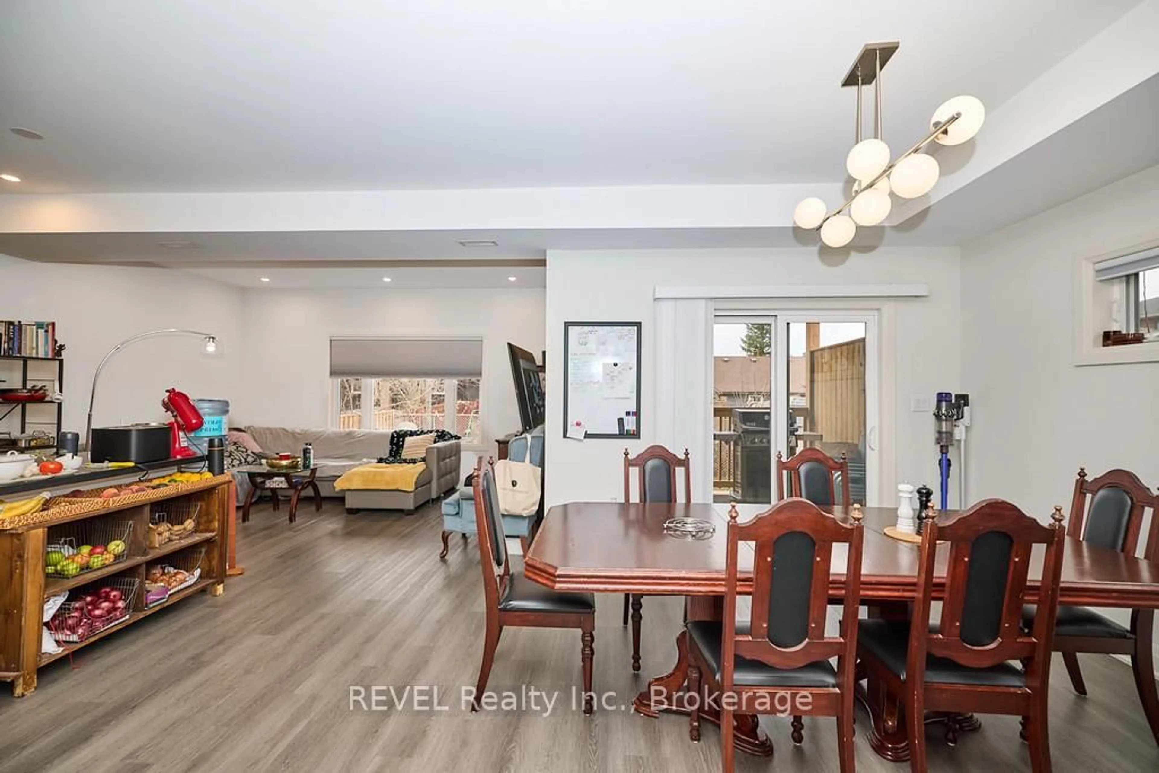 Dining room, wood/laminate floor for 8 Nash St, St. Catharines Ontario L2S 1B5