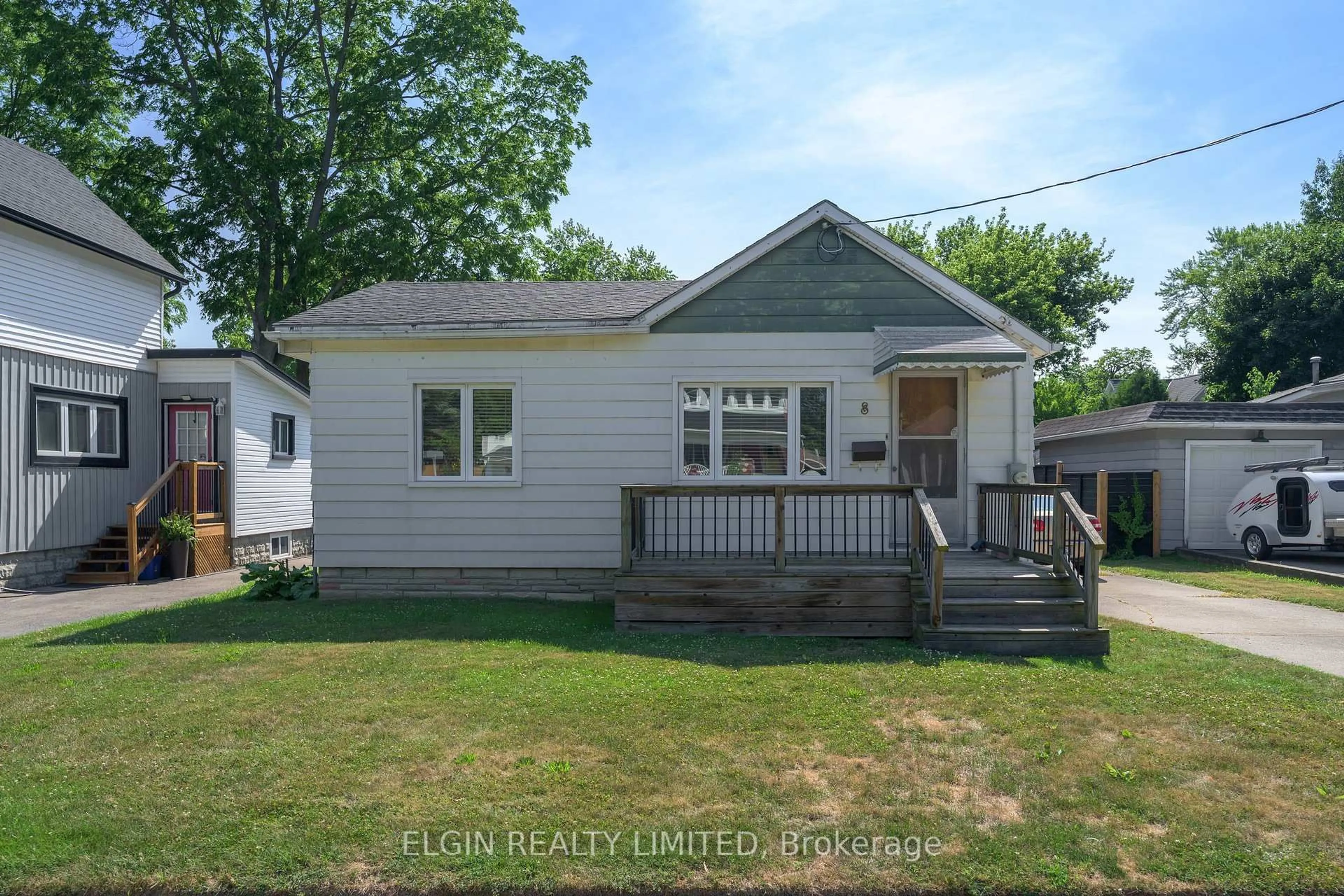 Home with vinyl exterior material, street for 8 Wilson Ave, St. Thomas Ontario N5R 3P8