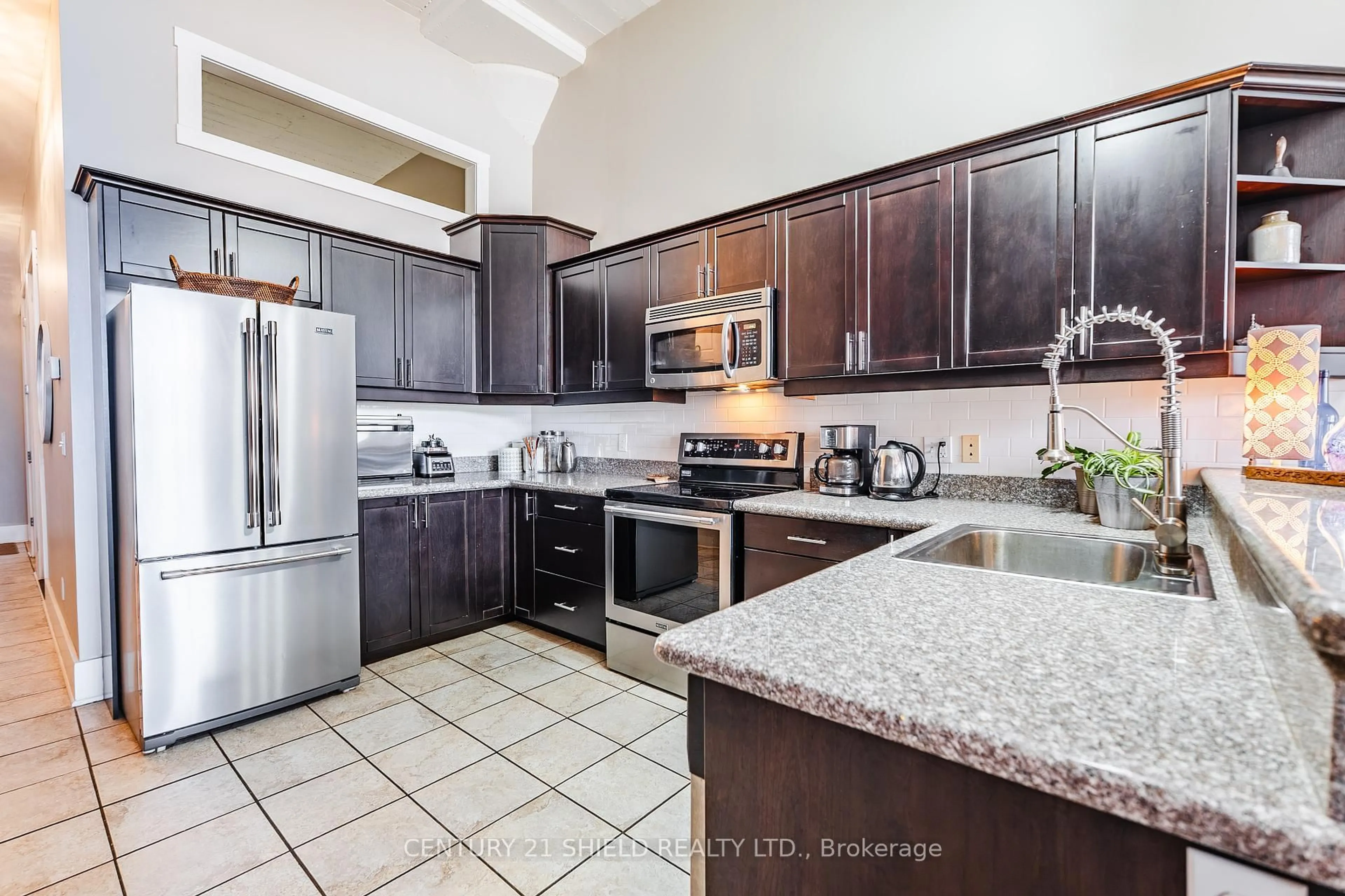 Open concept kitchen, ceramic/tile floor for 710 Cotton Mill St #210, Cornwall Ontario K6H 7L3