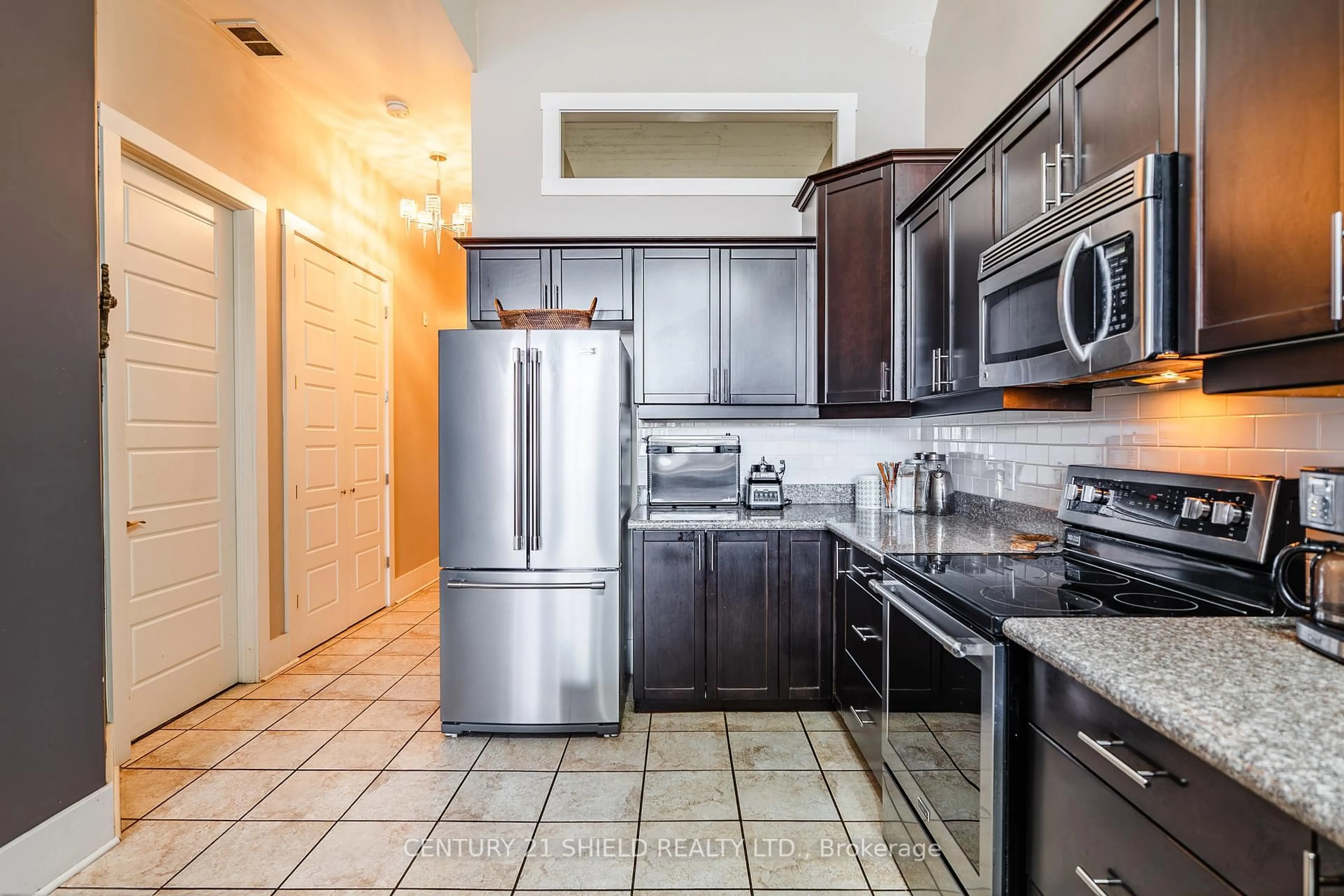 Standard kitchen, ceramic/tile floor for 710 Cotton Mill St #210, Cornwall Ontario K6H 7L3