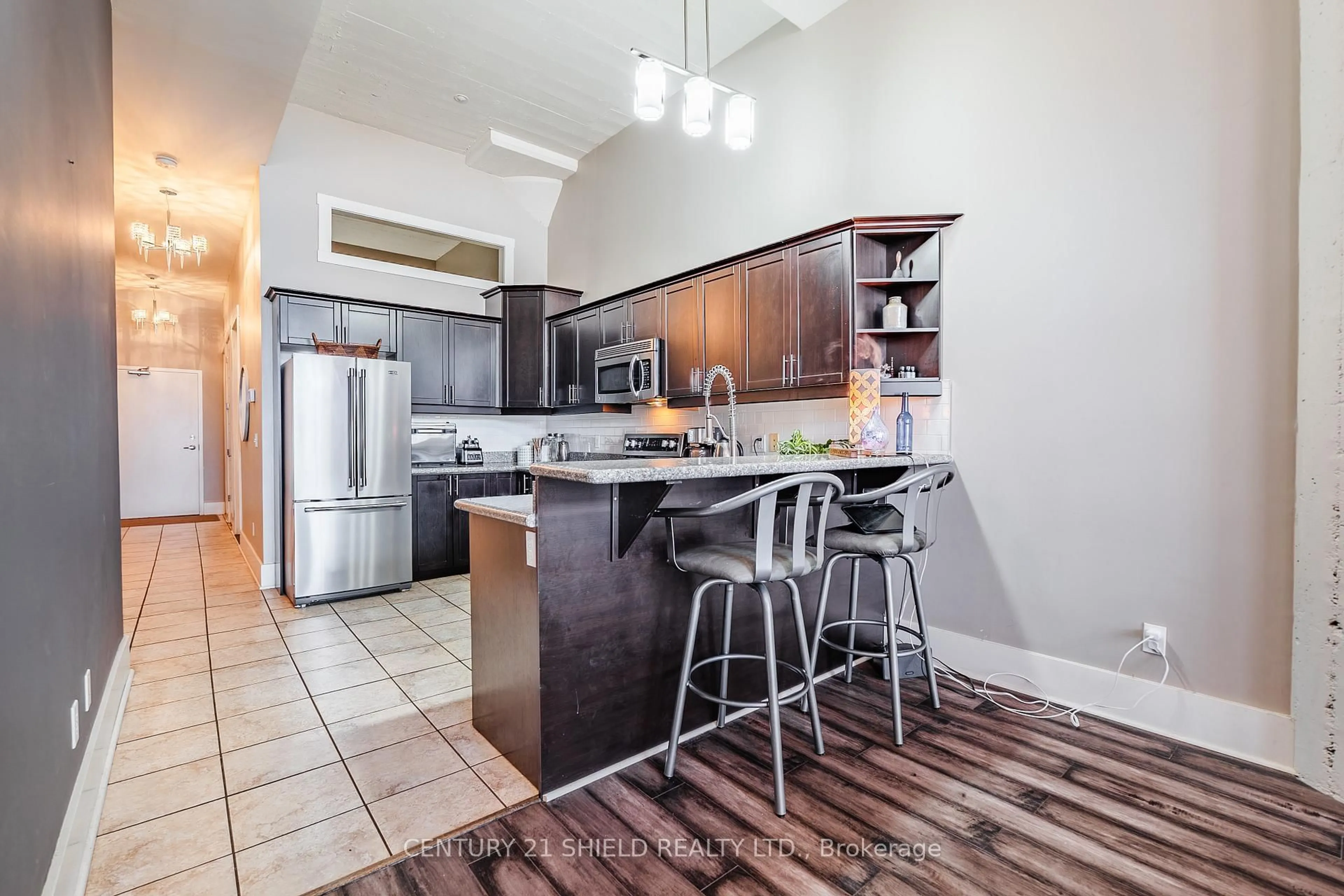 Open concept kitchen, ceramic/tile floor for 710 Cotton Mill St #210, Cornwall Ontario K6H 7L3
