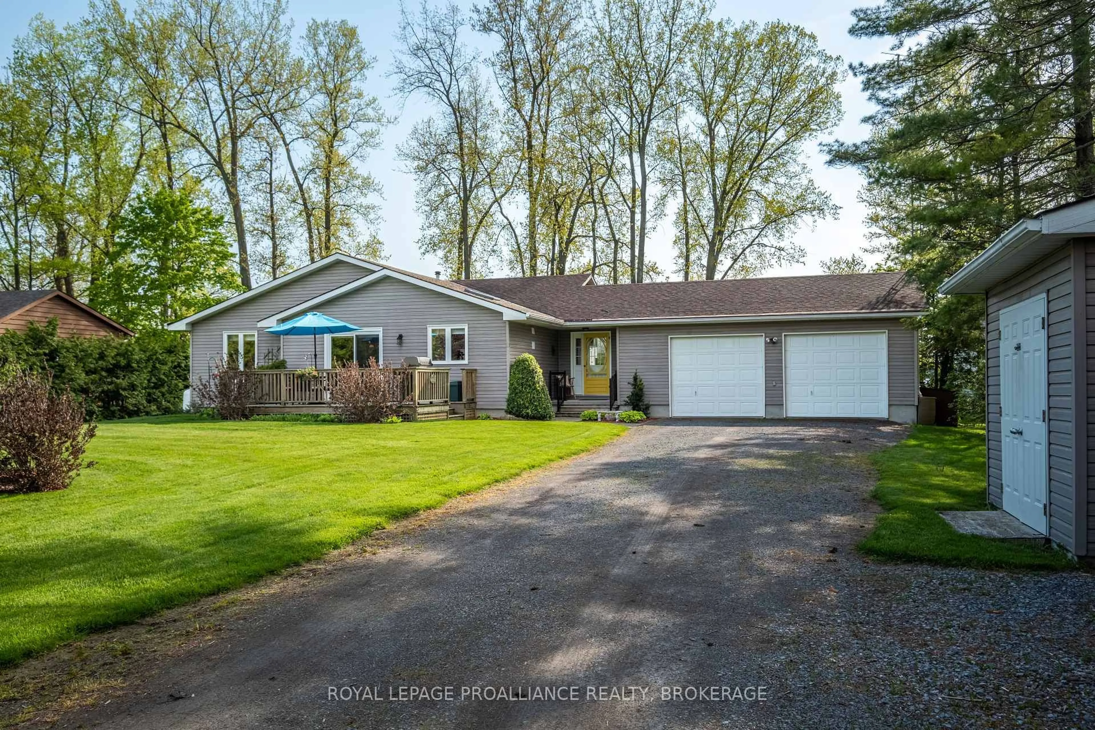 Home with vinyl exterior material, street for 14 Sunset Lane, Napanee Ontario K7R 3K7