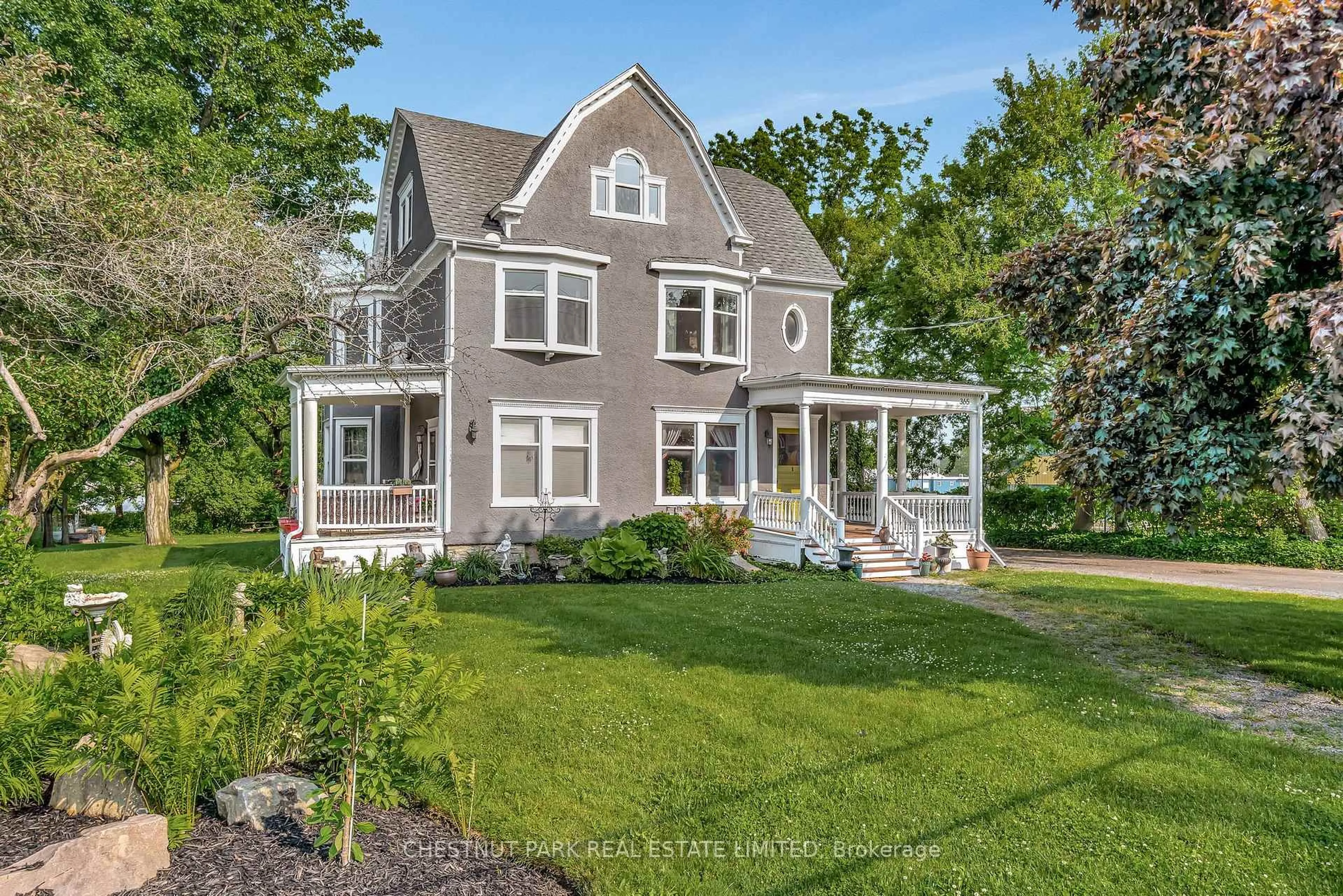 Home with vinyl exterior material, street for 365 Main St, Prince Edward County Ontario K0K 2T0
