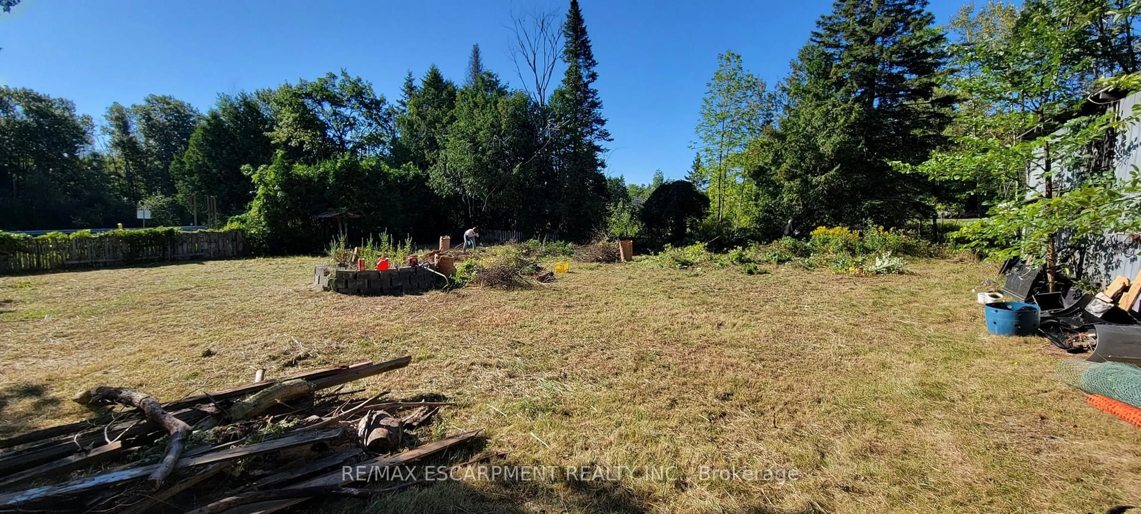 A pic from outside/outdoor area/front of a property/back of a property/a pic from drone, forest/trees view for 26-28 Algoma St, Spanish Ontario P0P 2A0