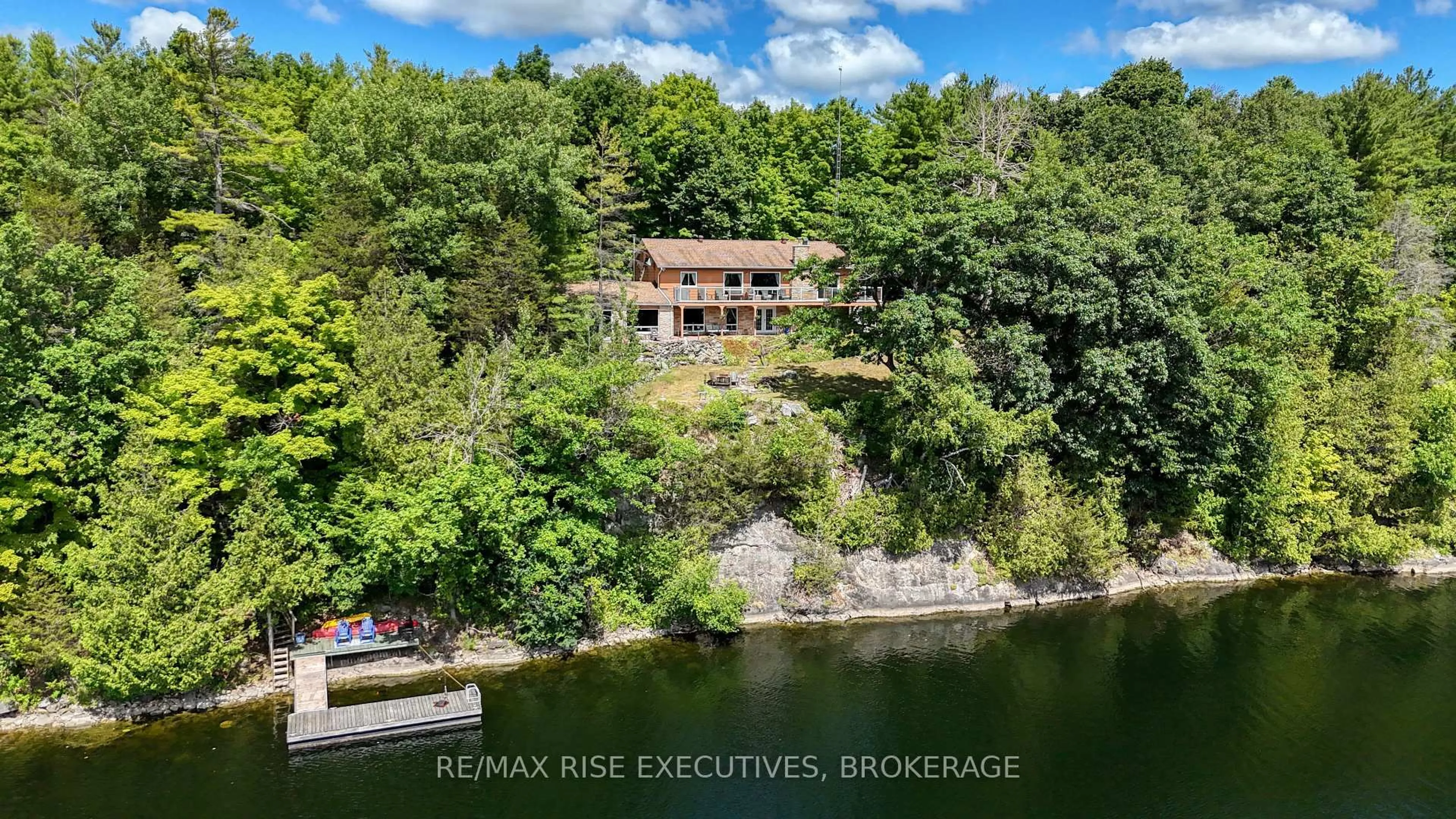 A pic from outside/outdoor area/front of a property/back of a property/a pic from drone, water/lake/river/ocean view for 3376 County Rd 3 Rd, Leeds and the Thousand Islands Ontario K0E 1N0