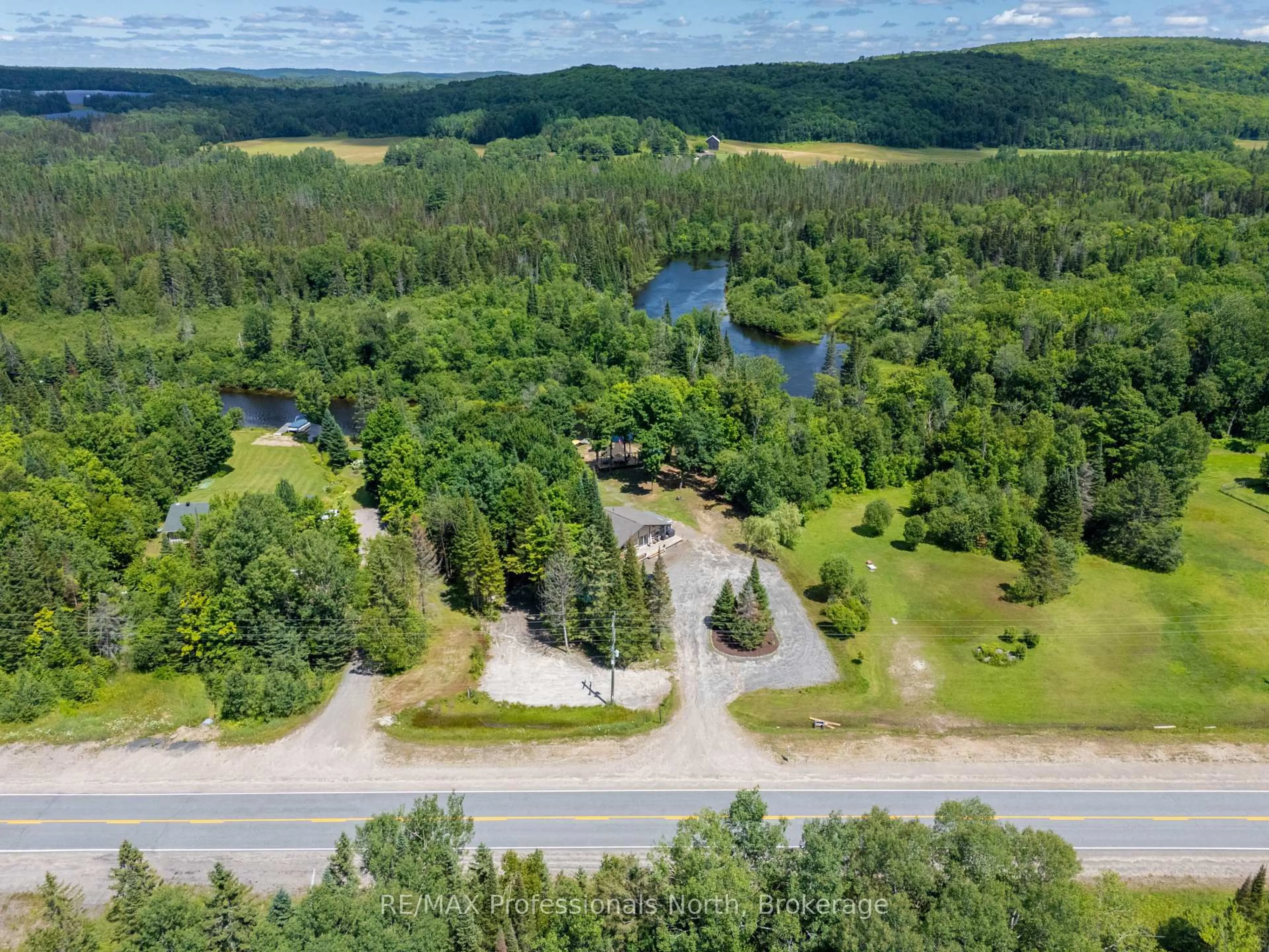 A pic from outside/outdoor area/front of a property/back of a property/a pic from drone, water/lake/river/ocean view for 899 KATRINE Rd, Burk's Falls Ontario P0A 1C0