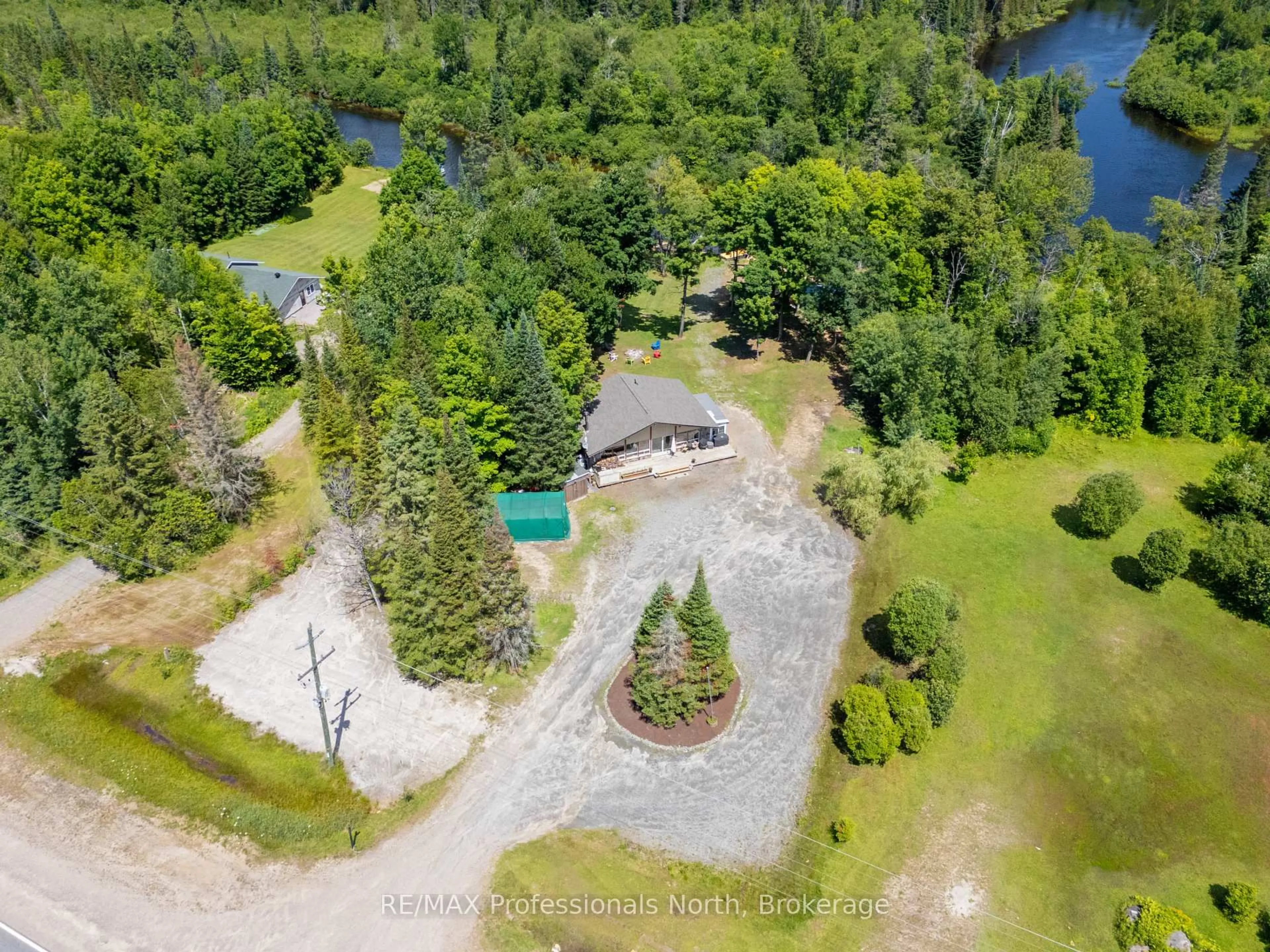 A pic from outside/outdoor area/front of a property/back of a property/a pic from drone, water/lake/river/ocean view for 899 KATRINE Rd, Burk's Falls Ontario P0A 1C0