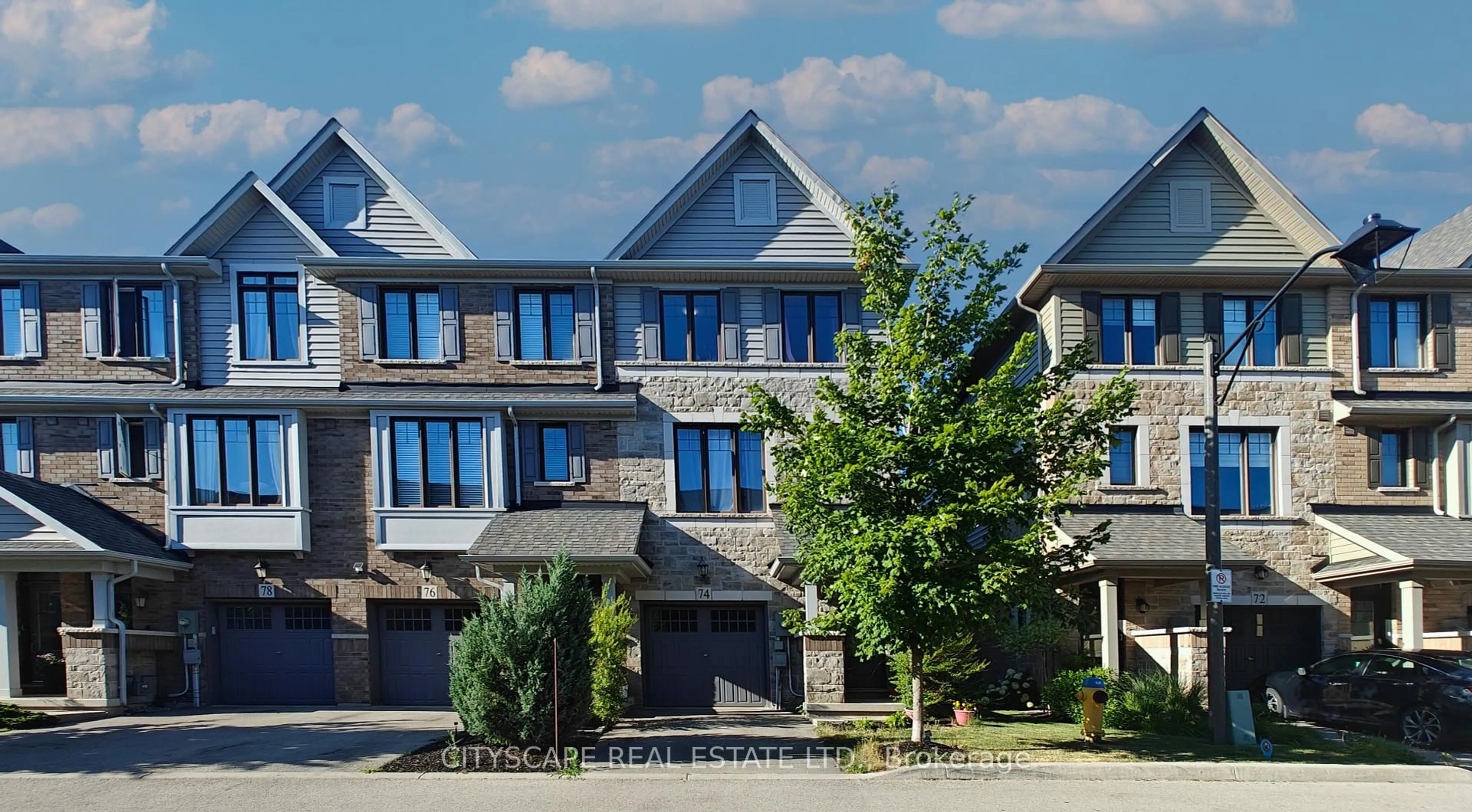 Home with brick exterior material, unknown for 74 Esplanade Lane, Grimsby Ontario L3M 0H2