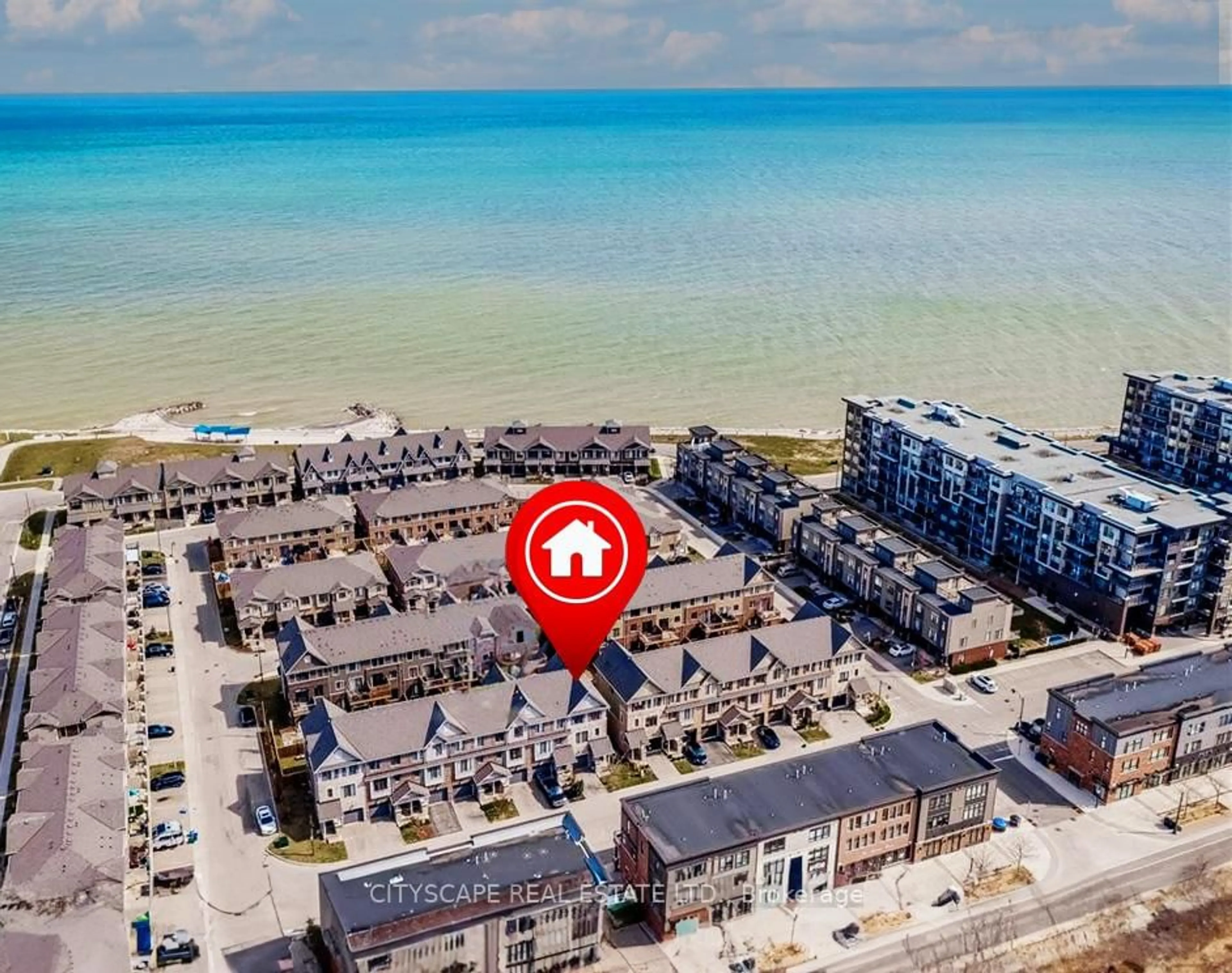 A pic from outside/outdoor area/front of a property/back of a property/a pic from drone, street for 74 Esplanade Lane, Grimsby Ontario L3M 0H2