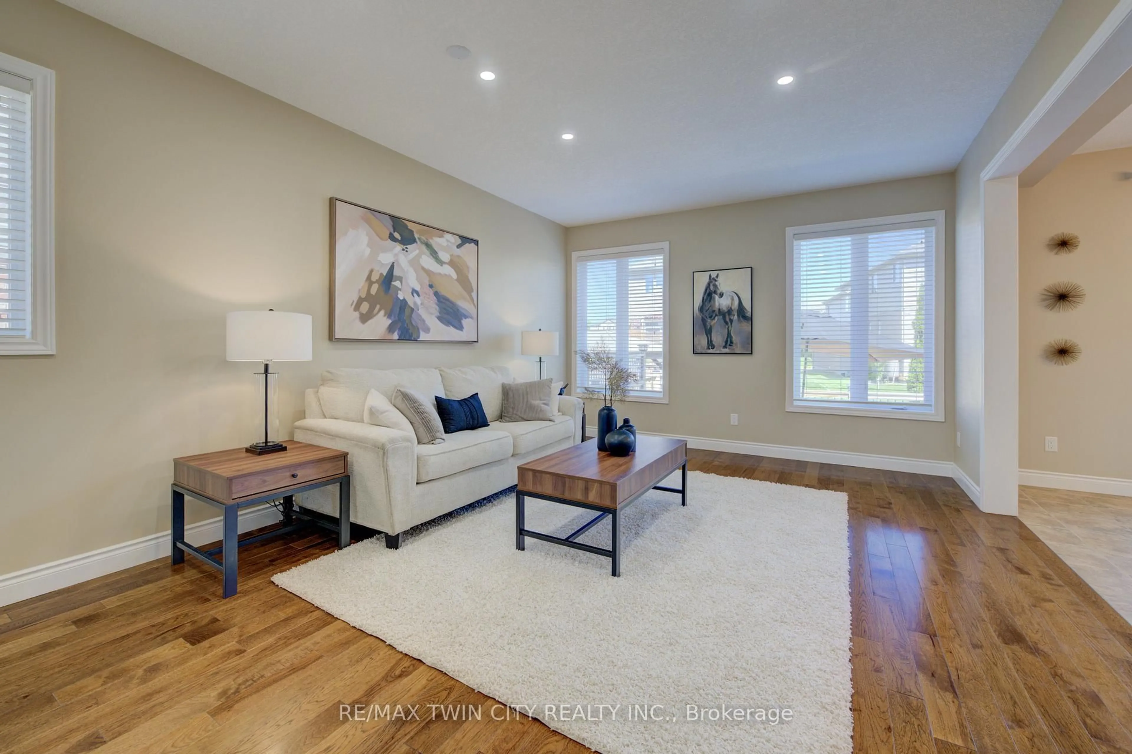 Living room with furniture, wood/laminate floor for 304 Westpark Cres, Waterloo Ontario N2T 0A4