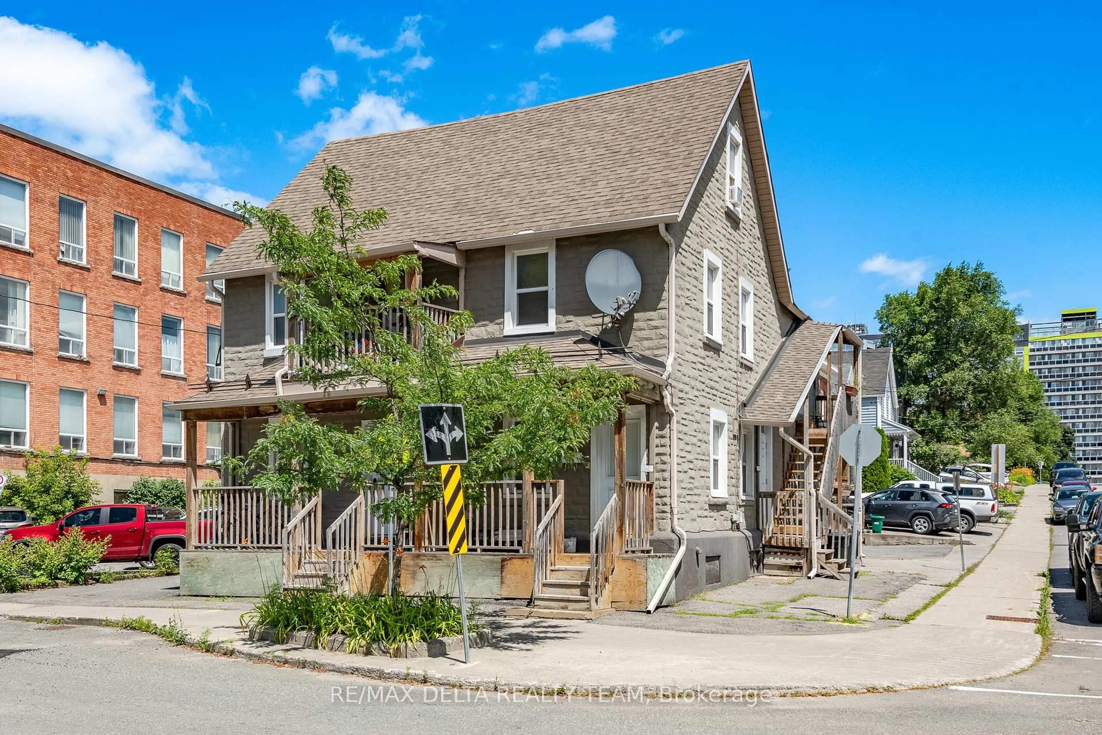 Home with brick exterior material, street for 437-439 BOOTH St, Ottawa Ontario K1R 7K8