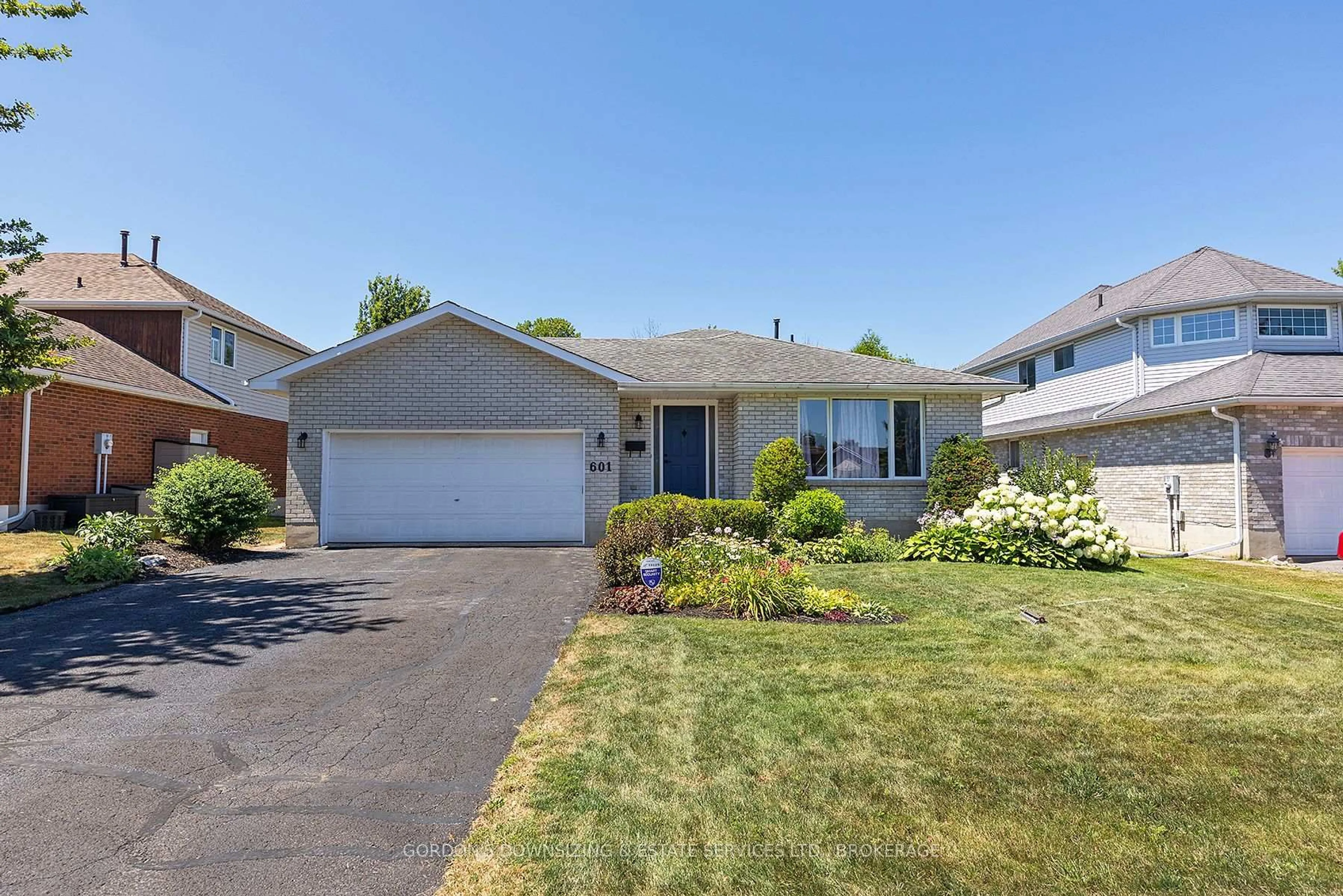 Home with vinyl exterior material, street for 601 Fernmoor Dr, Kingston Ontario K7M 8K5