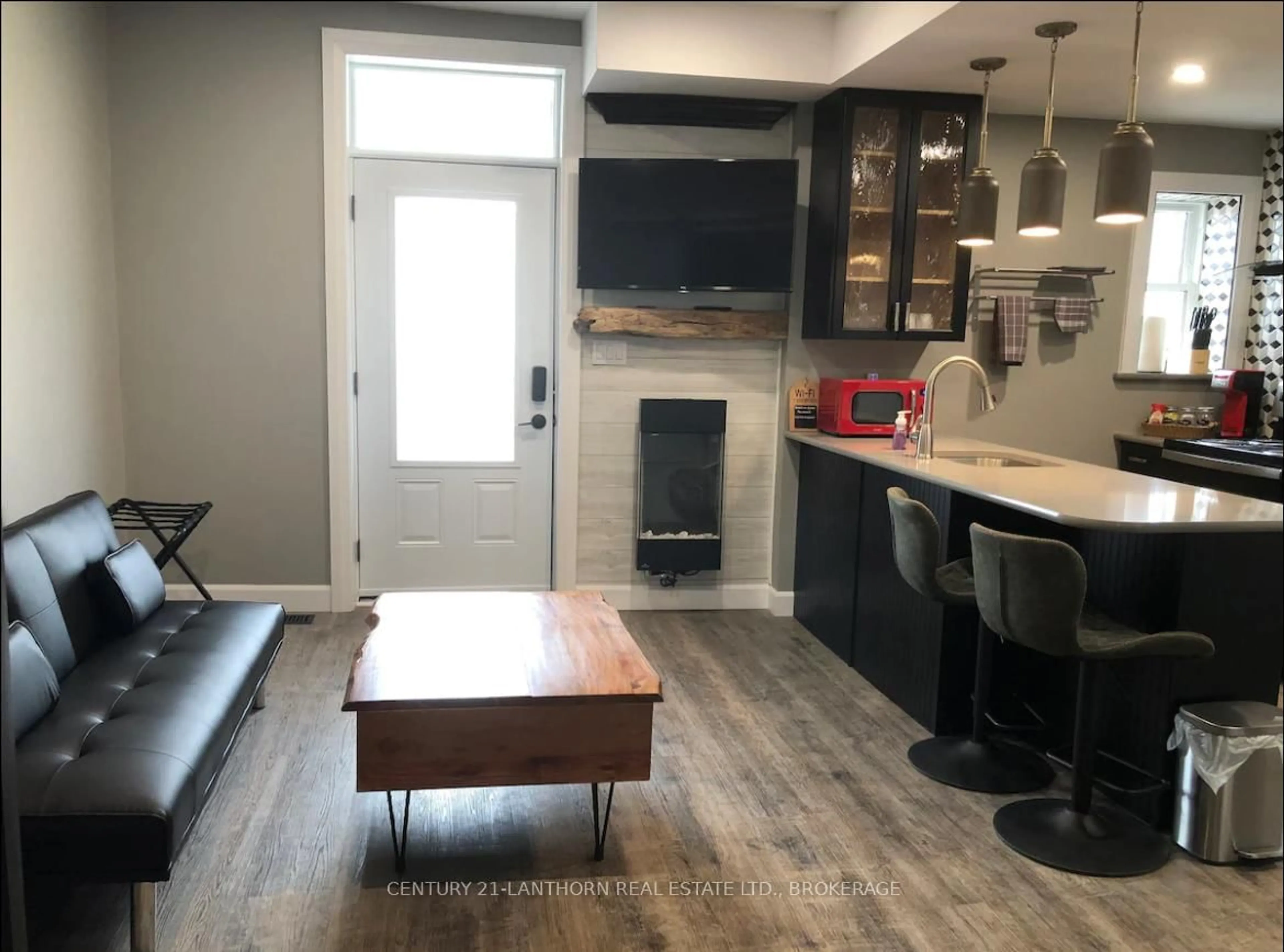 Open concept kitchen, wood/laminate floor for 45 Chestnut St, Kingston Ontario K7K 3X4