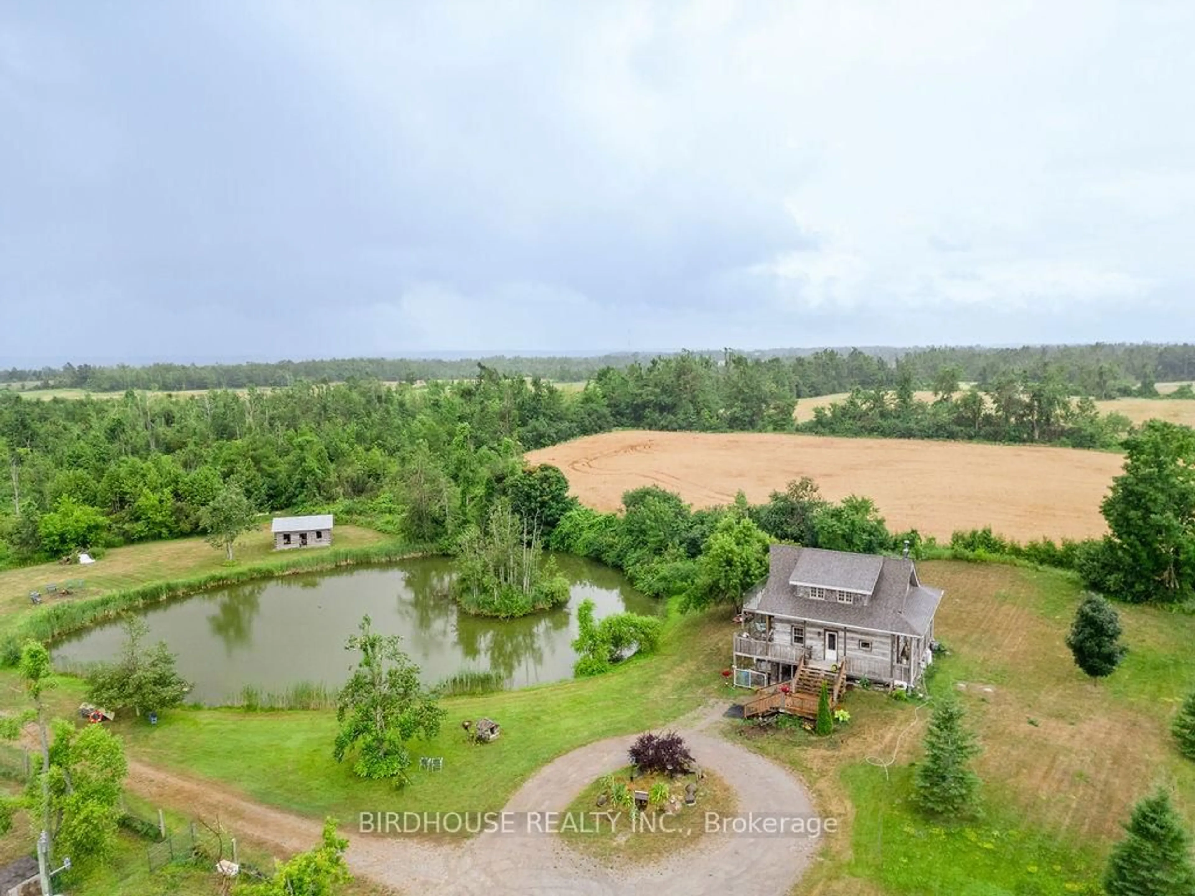 A pic from outside/outdoor area/front of a property/back of a property/a pic from drone, water/lake/river/ocean view for 175 County Road 49, Kawartha Lakes Ontario K0M 1A0
