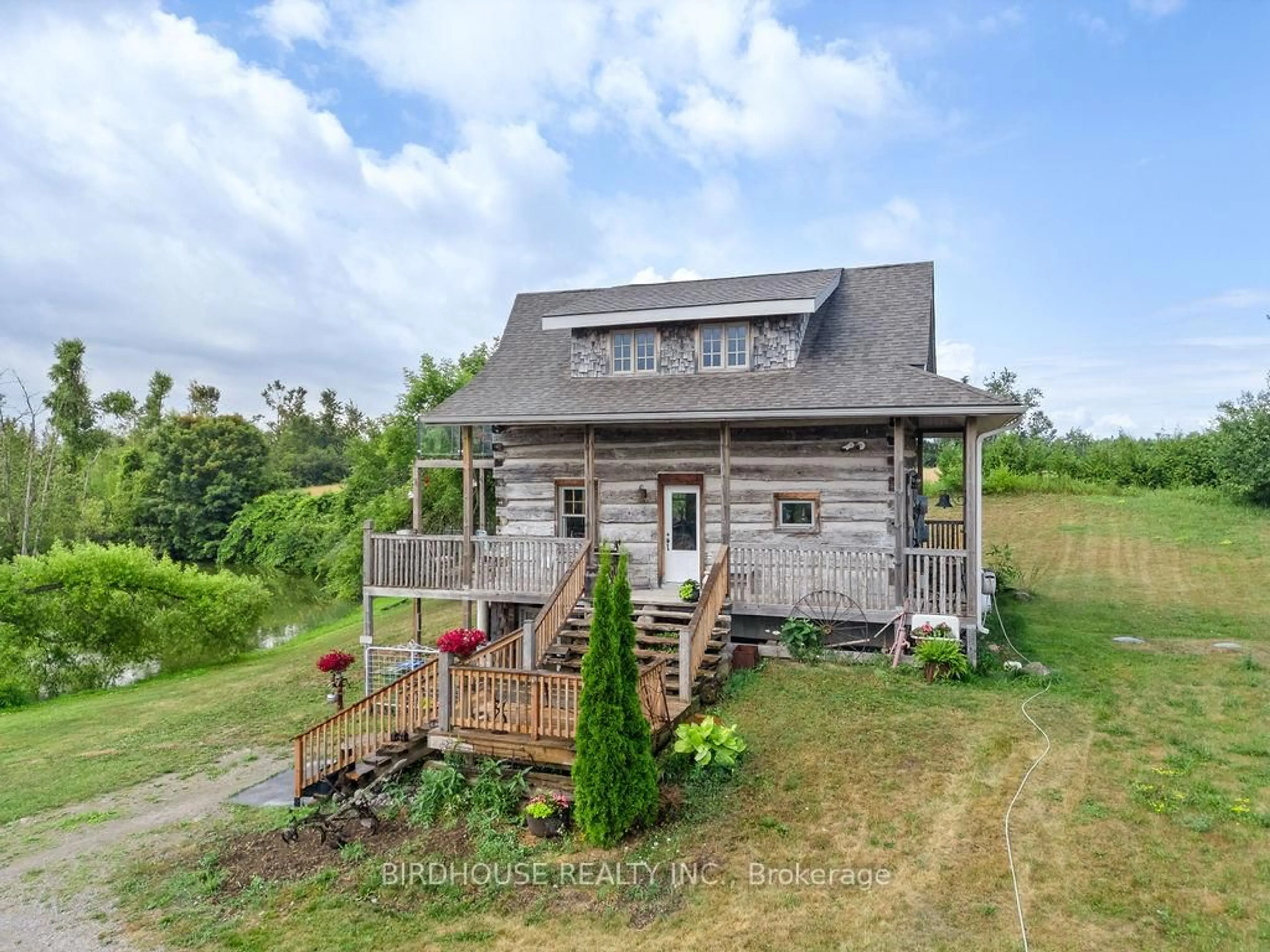 A pic from outside/outdoor area/front of a property/back of a property/a pic from drone, unknown for 175 County Road 49, Kawartha Lakes Ontario K0M 1A0