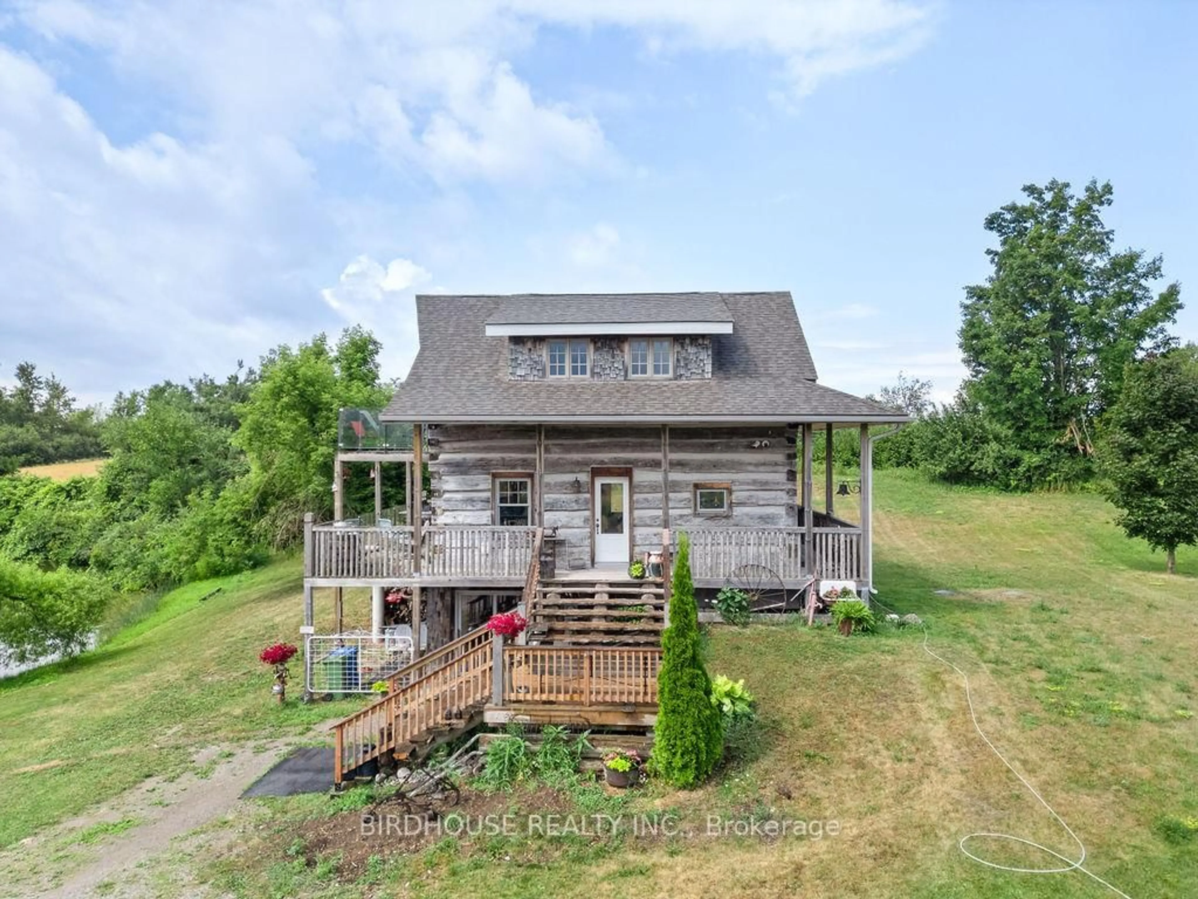 A pic from outside/outdoor area/front of a property/back of a property/a pic from drone, unknown for 175 County Road 49, Kawartha Lakes Ontario K0M 1A0