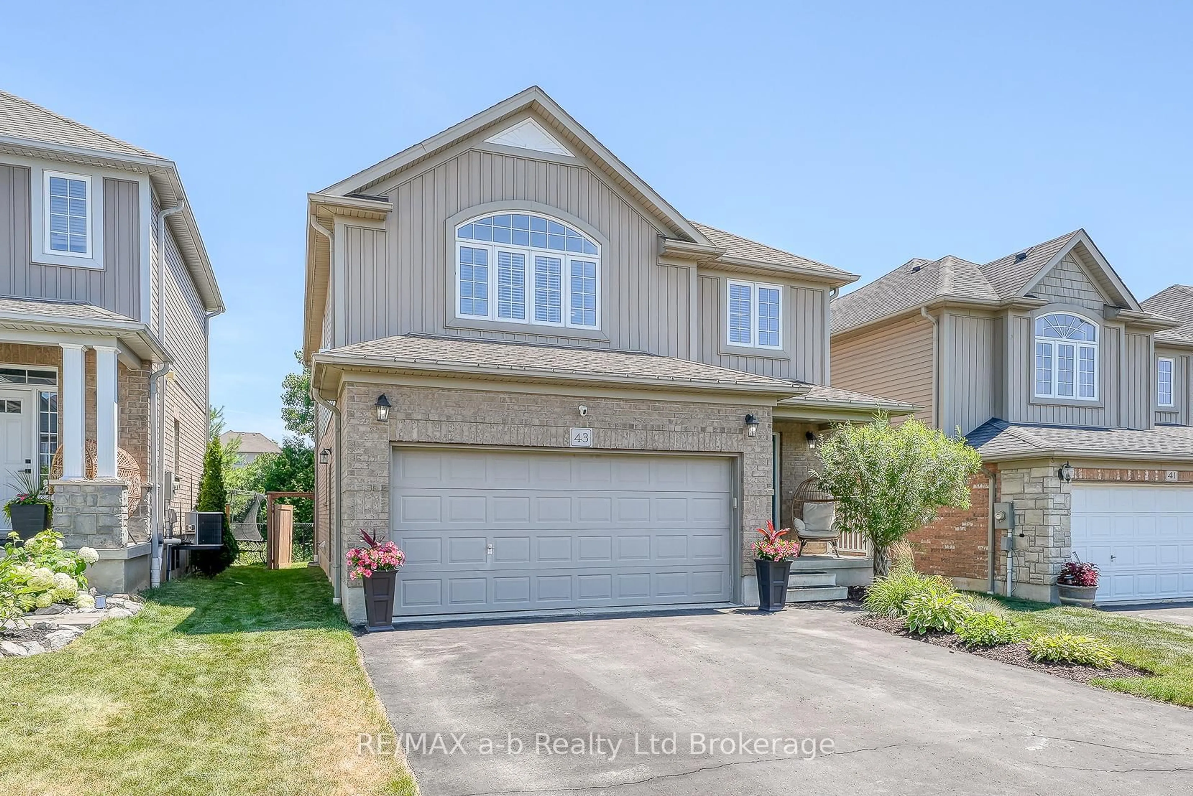 Home with vinyl exterior material, street for 43 Robert Simone Way, North Dumfries Ontario N0B 1E0