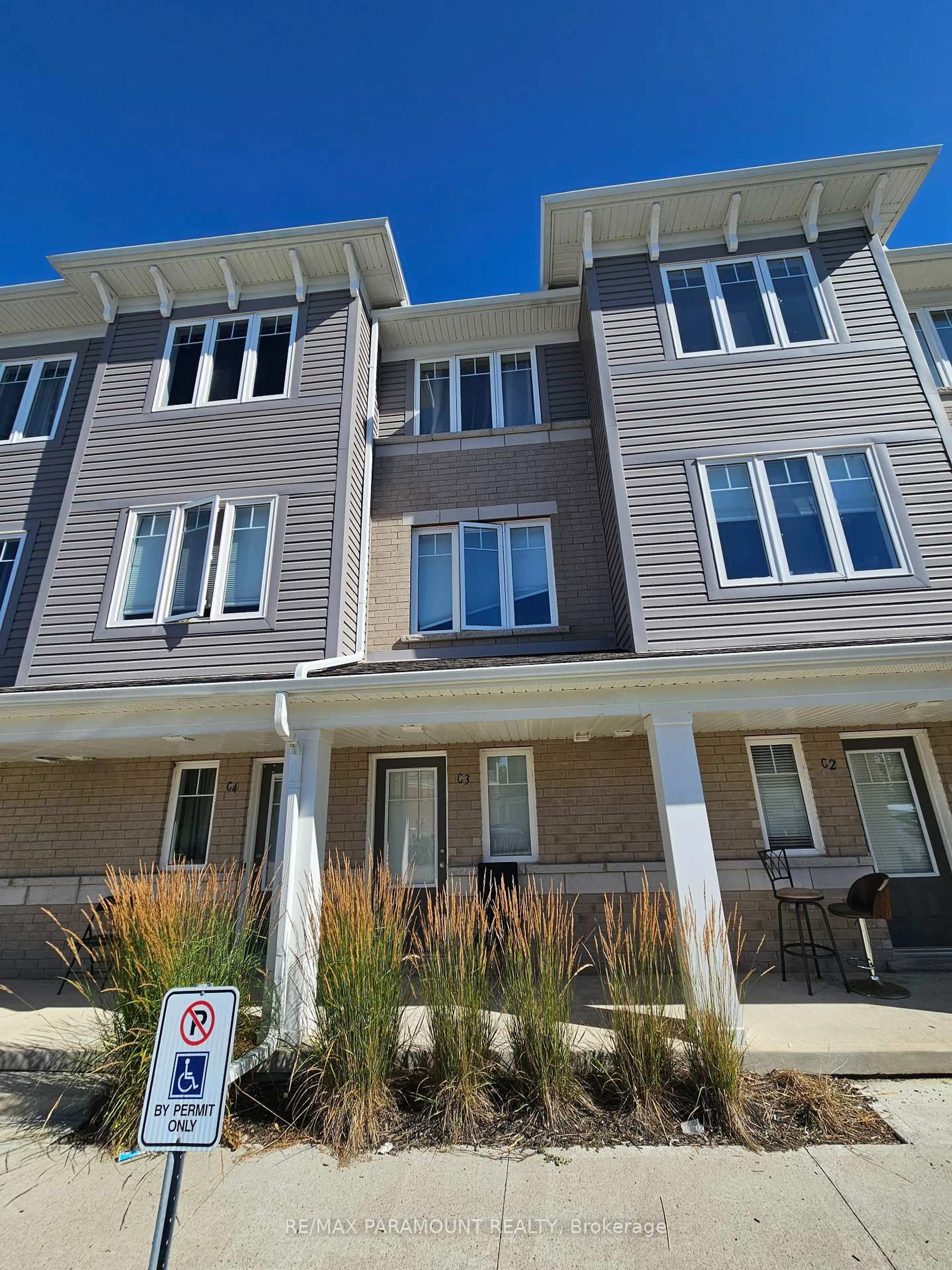 Home with vinyl exterior material, street for 24 Morrison Rd #C3, Kitchener Ontario N2A 0L1