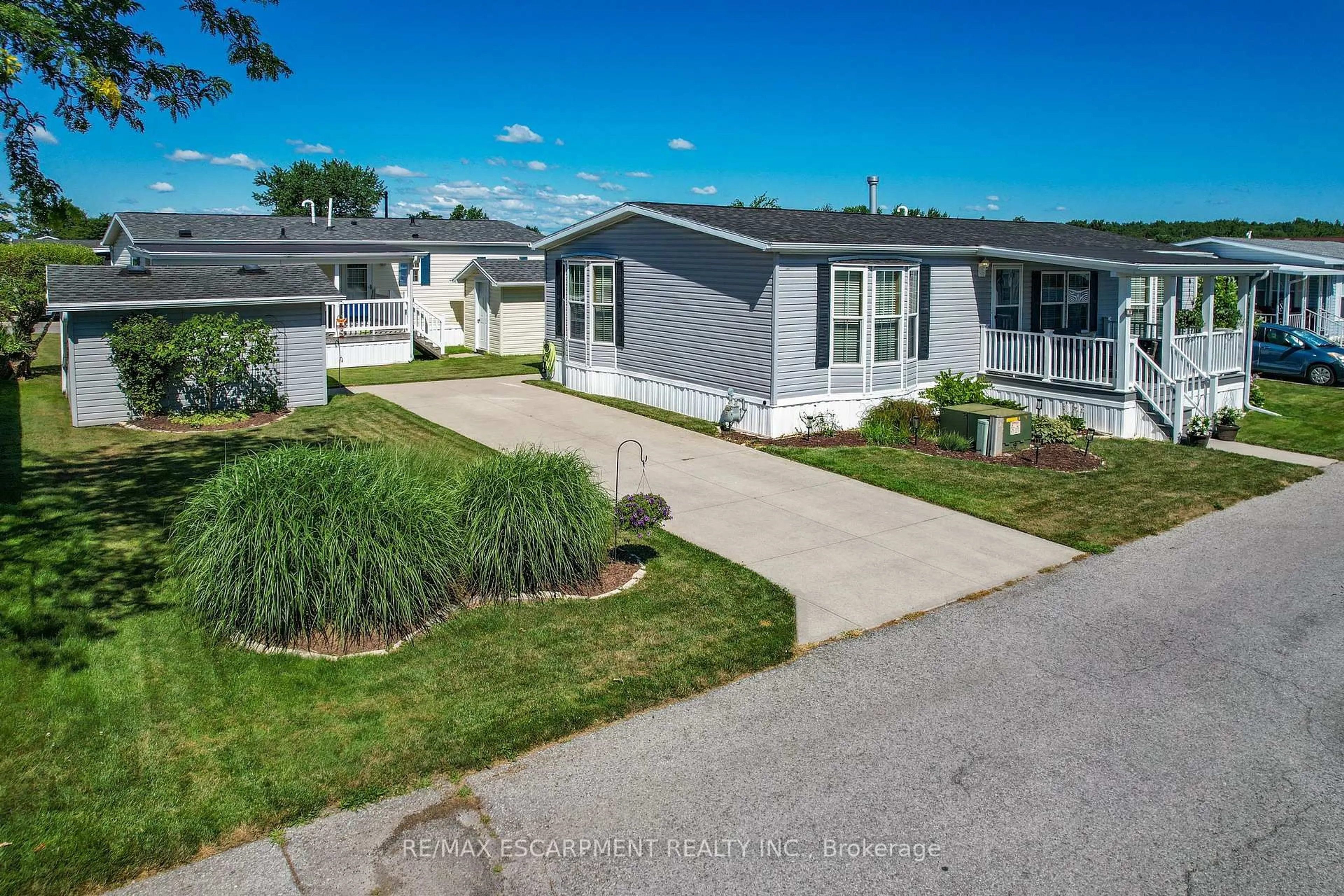 A pic from outside/outdoor area/front of a property/back of a property/a pic from drone, street for 3033 Townline Rd #280, Fort Erie Ontario L0S 1S1