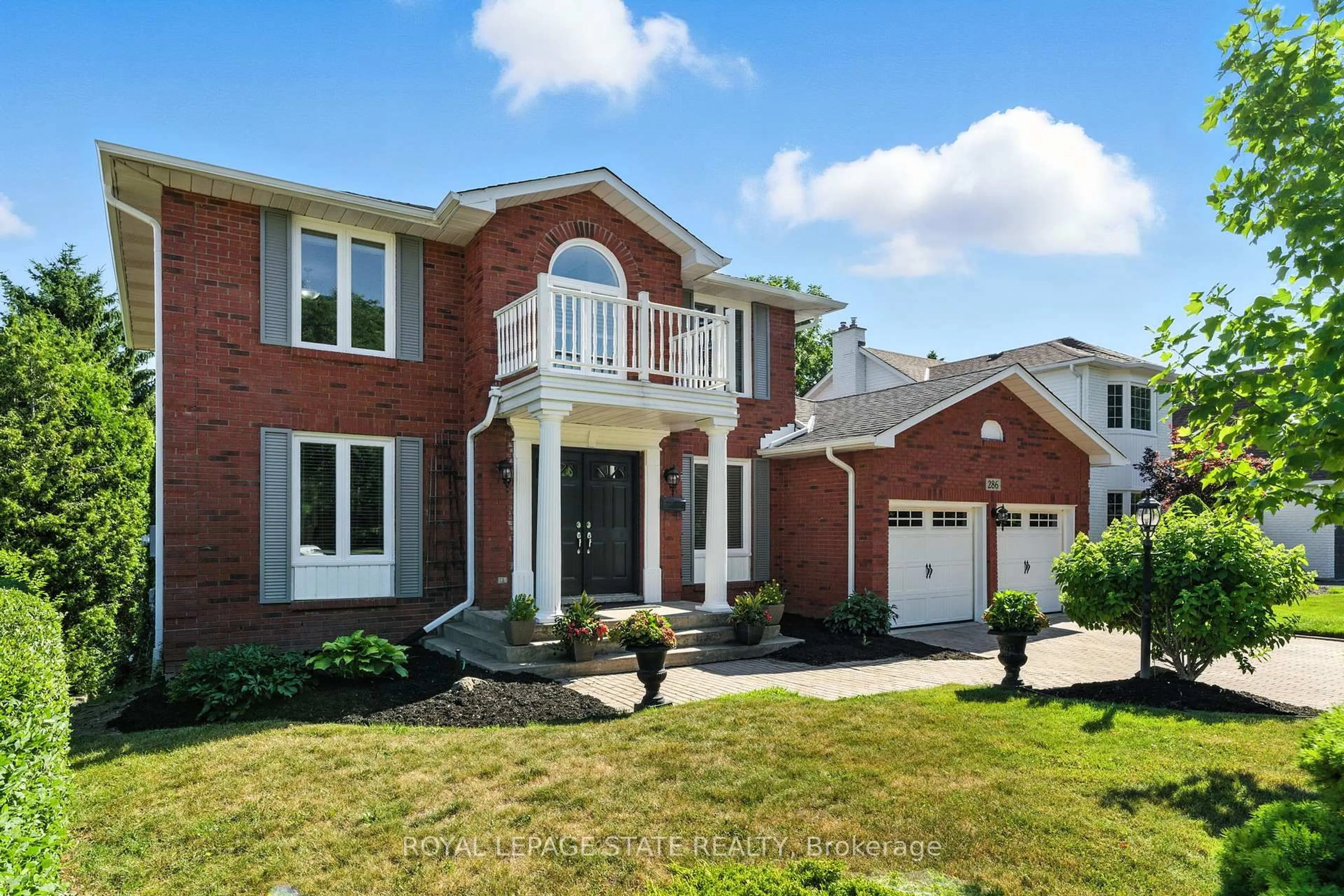 Home with brick exterior material, street for 286 LLOYMINN Ave, Hamilton Ontario L9G 1J1