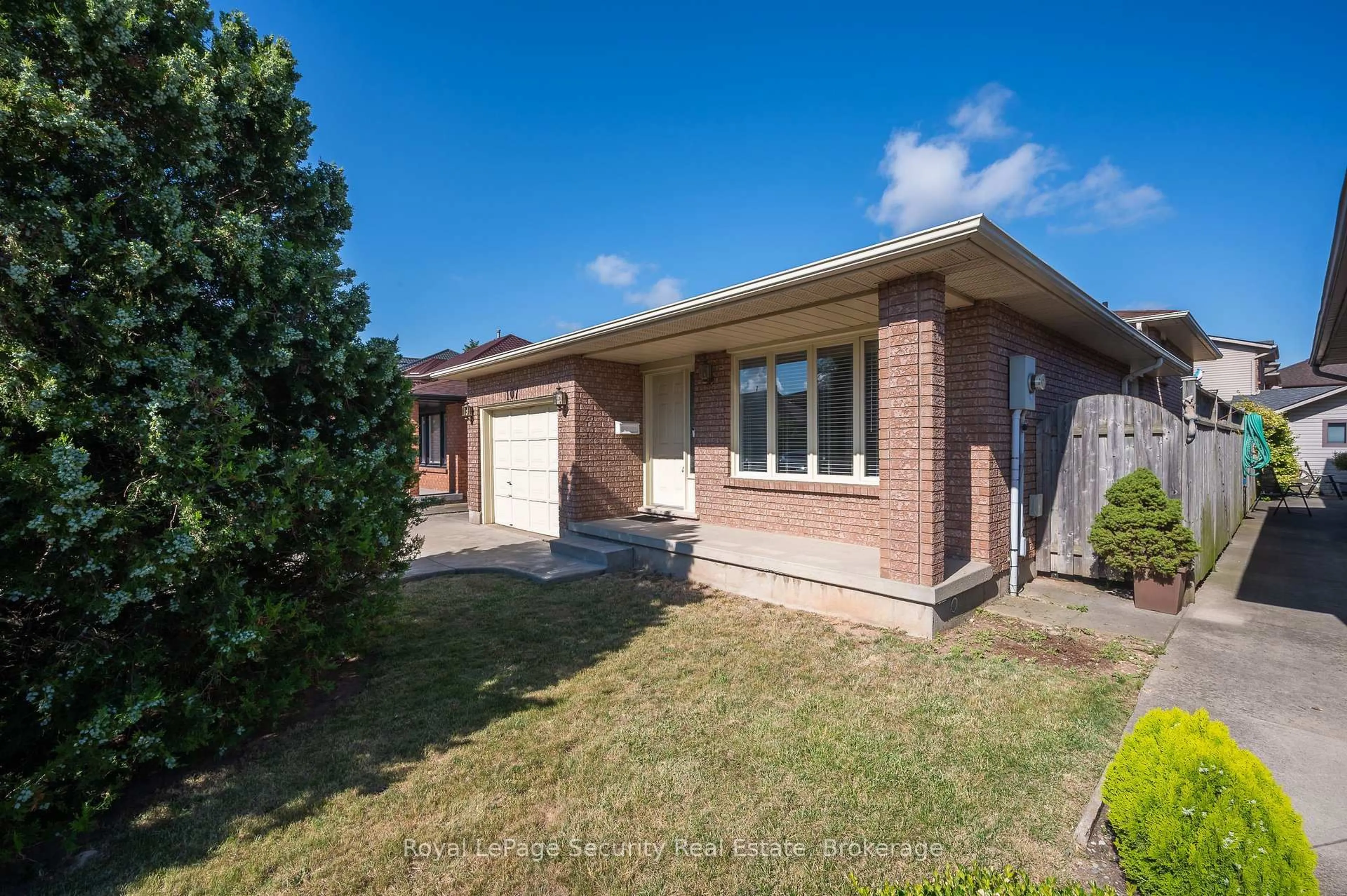 Home with brick exterior material, street for 107 Fairington Cres, Hamilton Ontario L8E 3N3