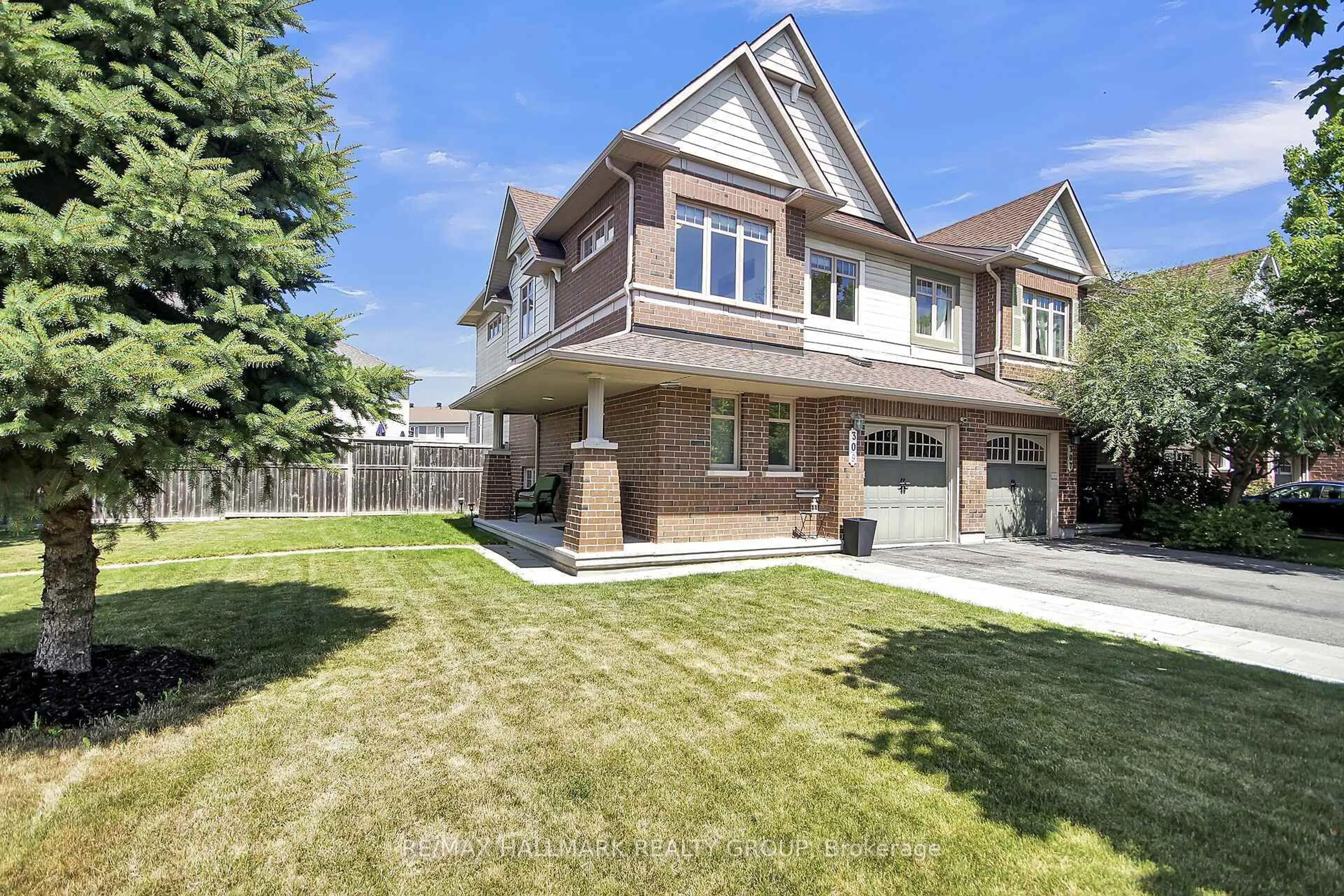 Home with brick exterior material, street for 309 Balinroan Cres, Ottawa Ontario K2J 3T7