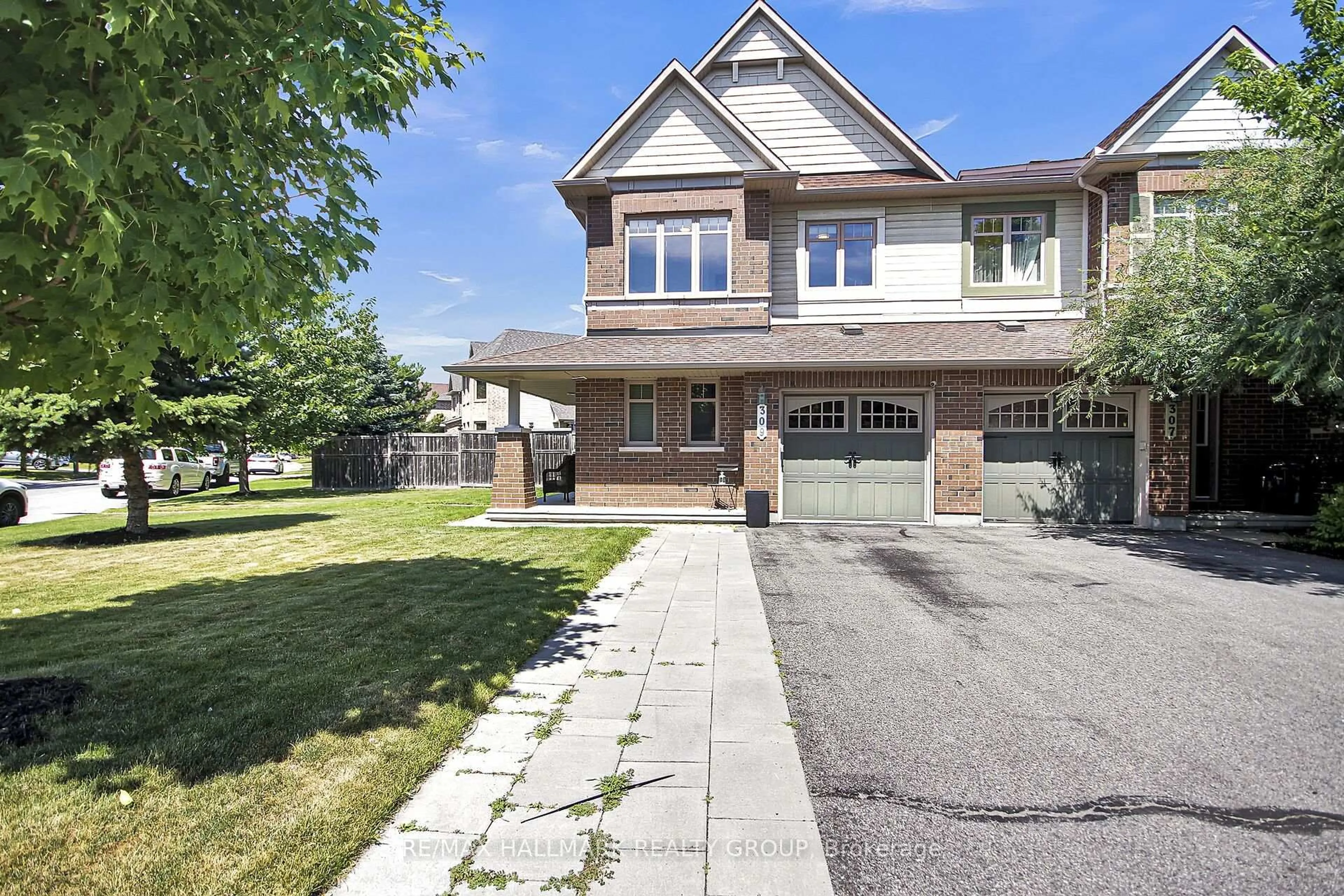 Home with brick exterior material, street for 309 Balinroan Cres, Ottawa Ontario K2J 3T7