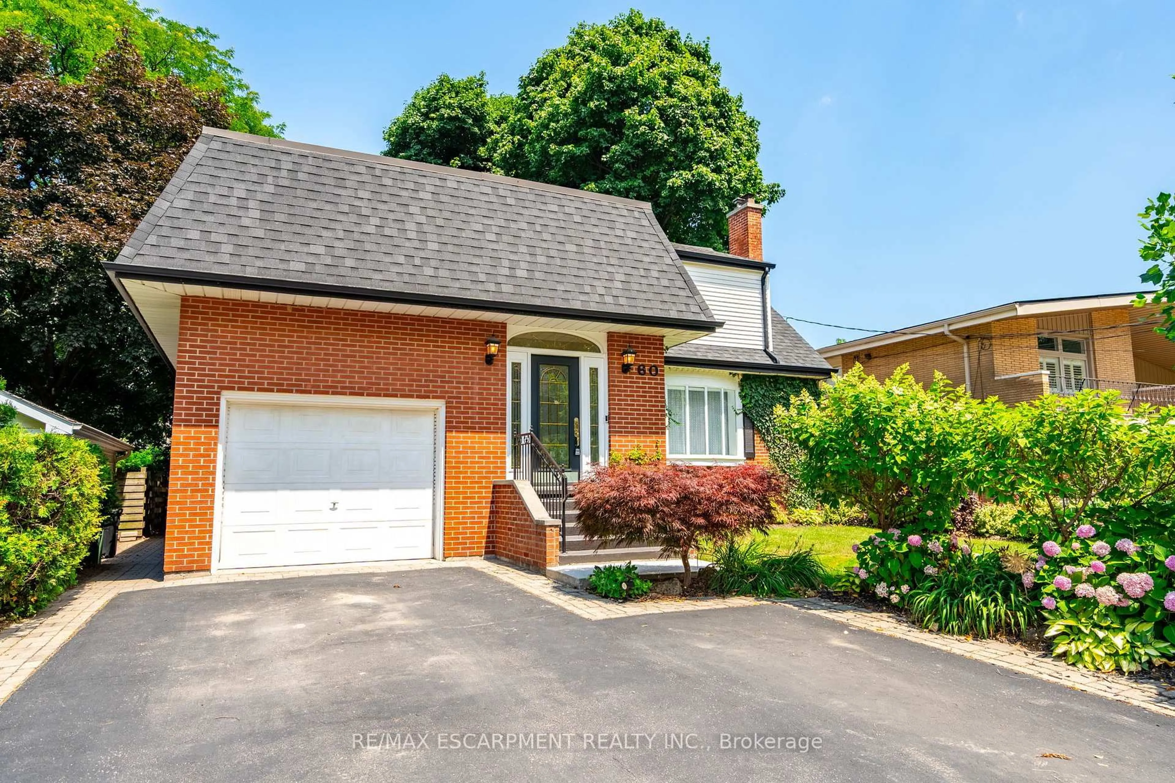 Home with brick exterior material, street for 60 Inverness Ave, Hamilton Ontario L9C 1A4