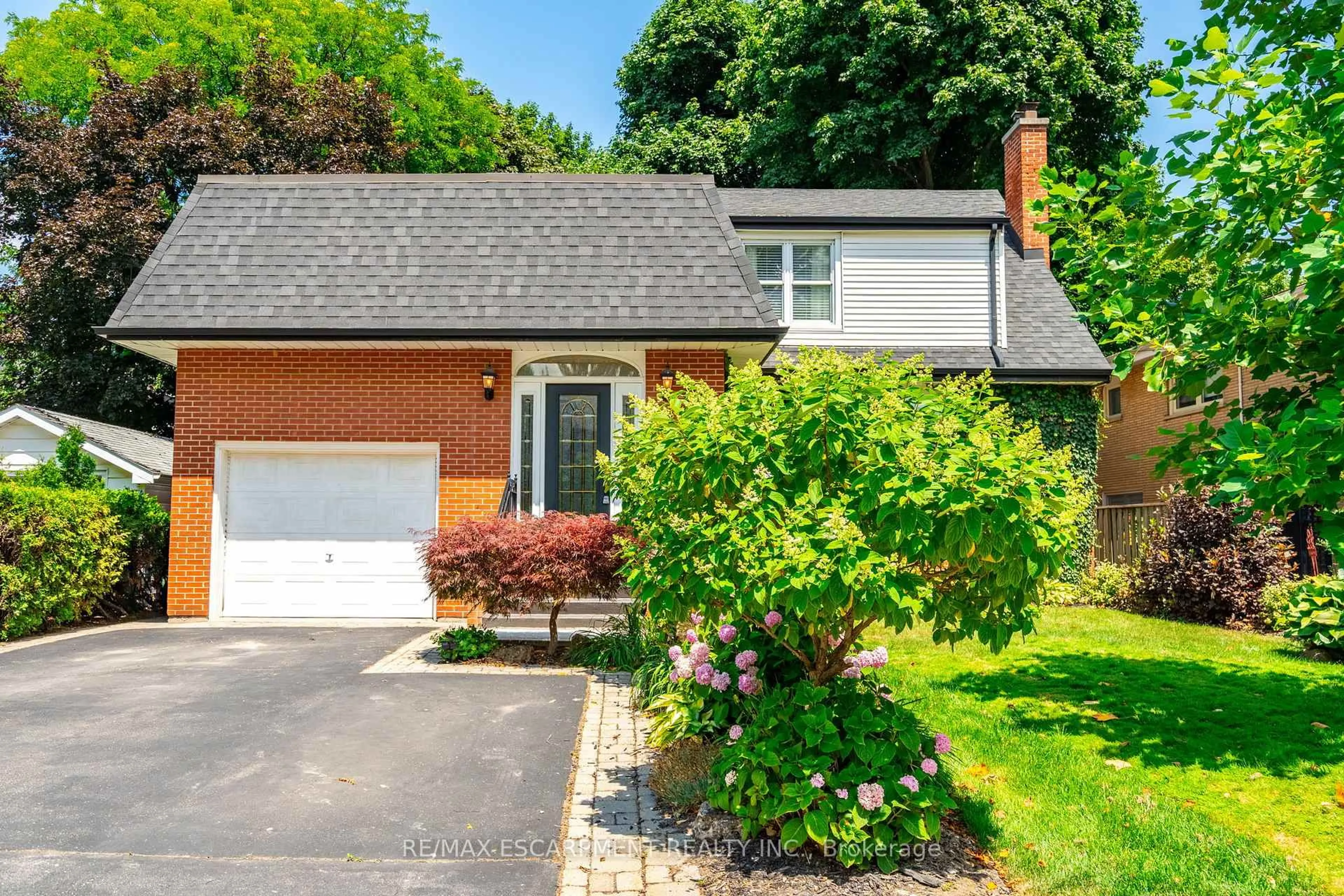 Home with brick exterior material, street for 60 Inverness Ave, Hamilton Ontario L9C 1A4
