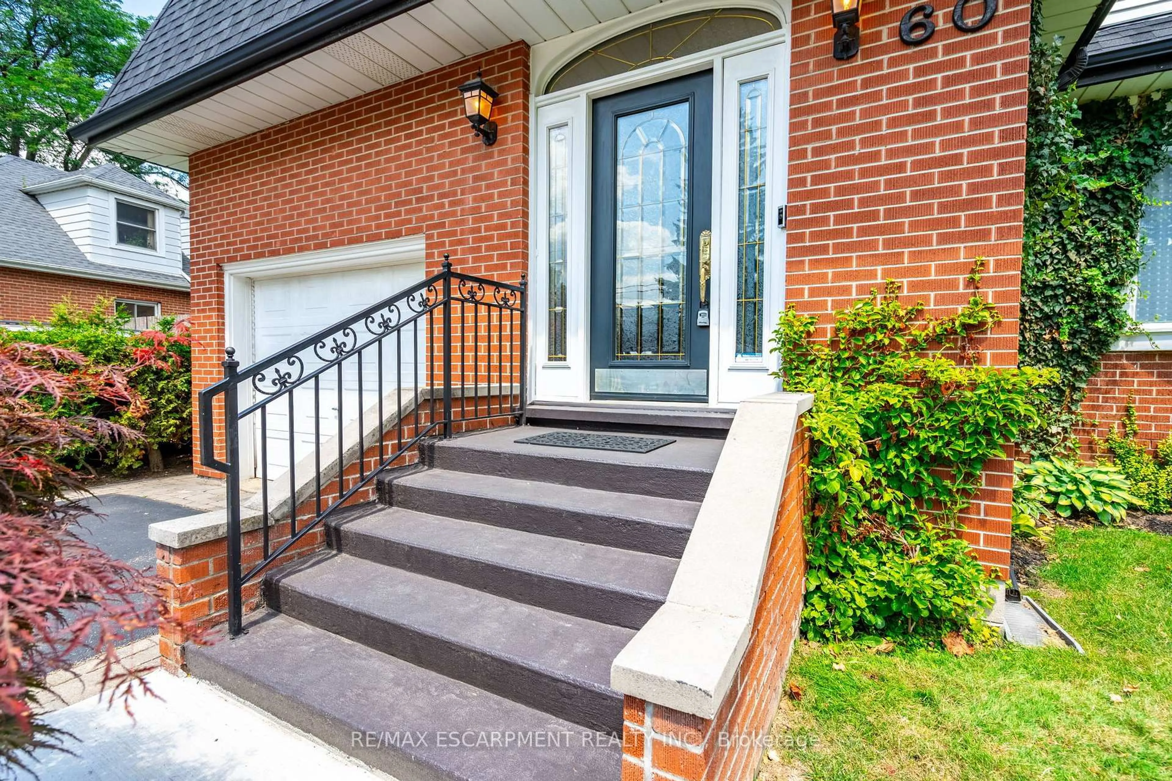 Home with brick exterior material, street for 60 Inverness Ave, Hamilton Ontario L9C 1A4