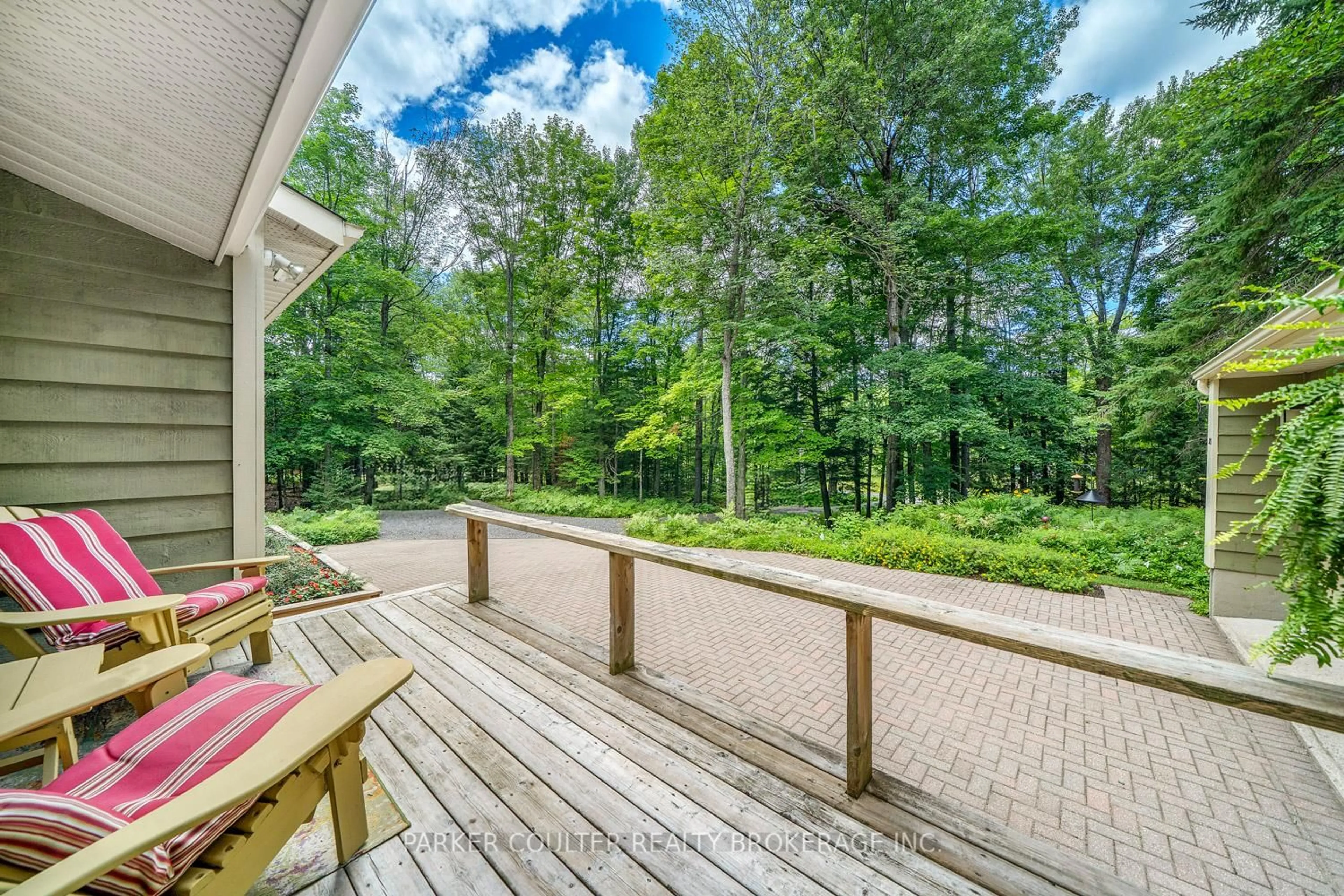 Patio, forest/trees view for 385 Chub Lake Rd, Huntsville Ontario P1H 2J3