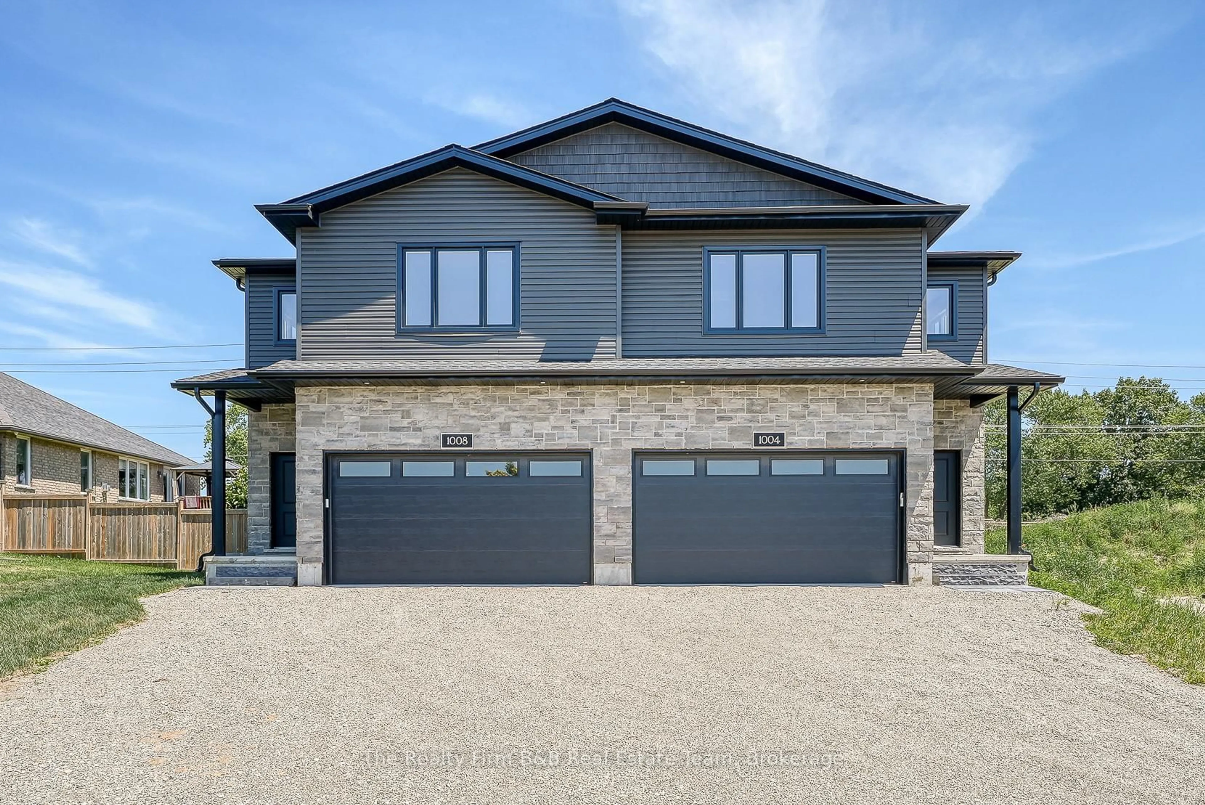 Home with brick exterior material, street for 1004 DOWNING Dr, Woodstock Ontario N4T 0K4