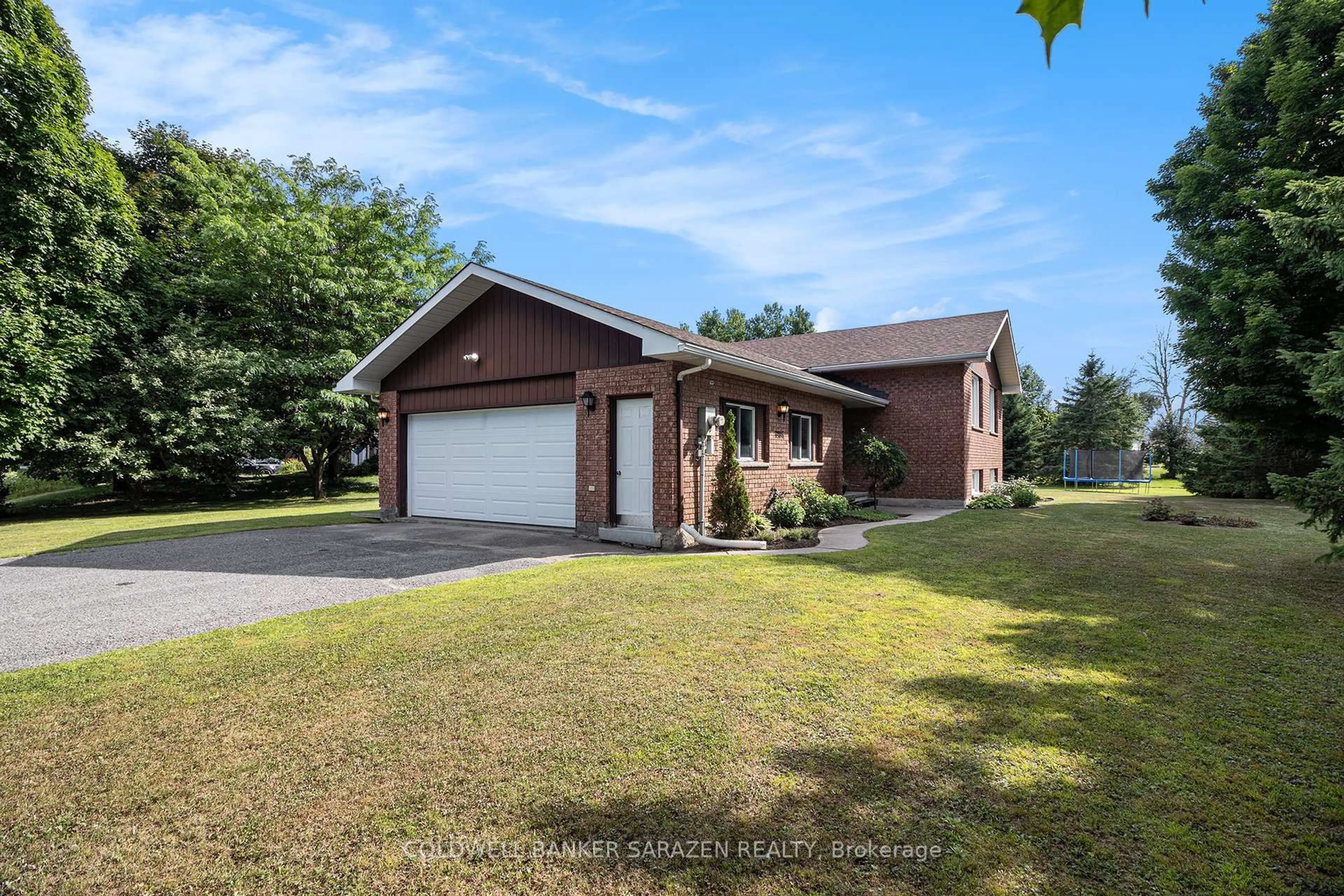 Home with brick exterior material, street for 8986 Clelland Way, Kenmore Ontario K0A 2G0