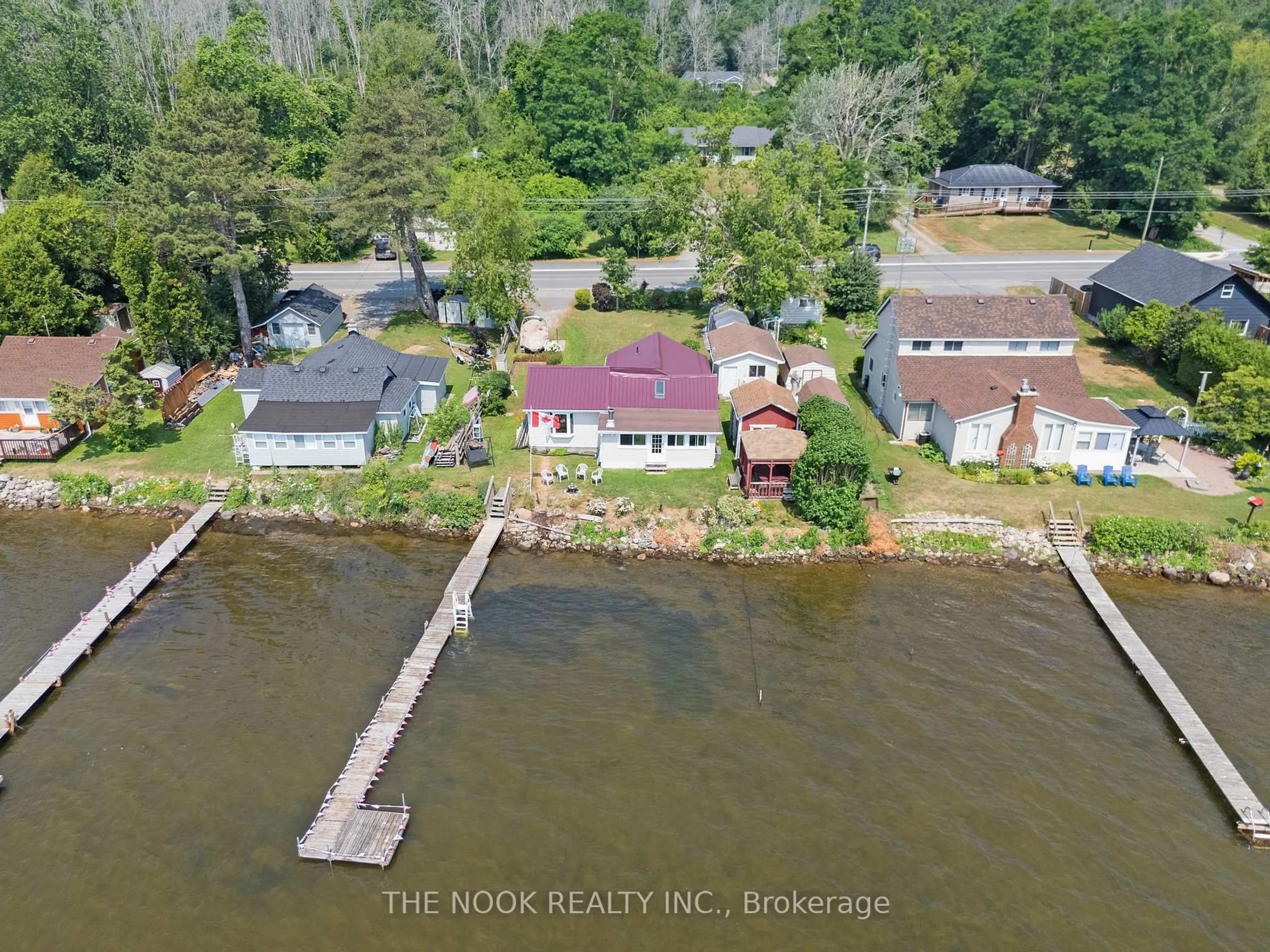 A pic from outside/outdoor area/front of a property/back of a property/a pic from drone, water/lake/river/ocean view for 187 Paudash St, Hiawatha First Nation Ontario K9J 6X8