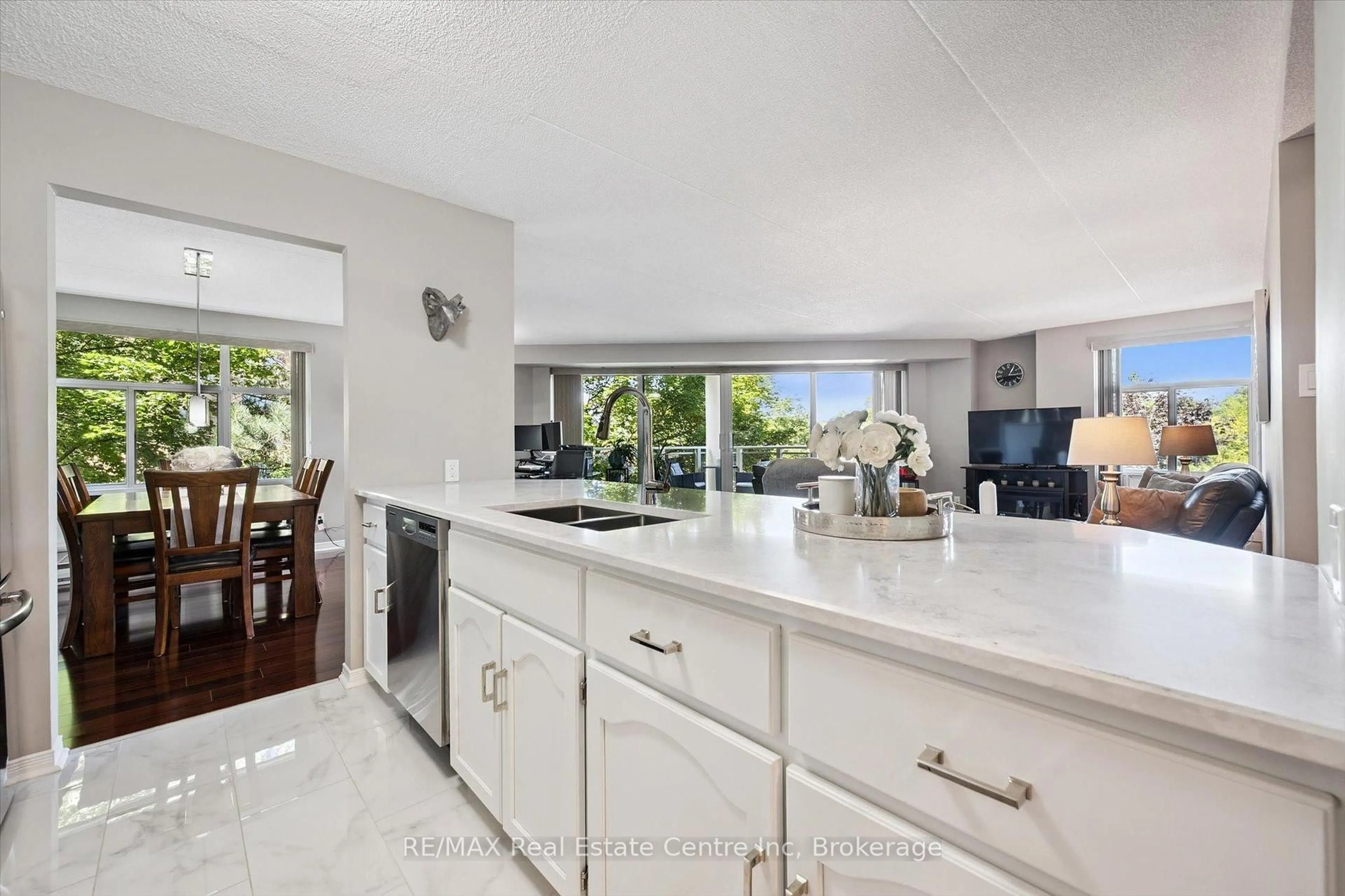 Open concept kitchen, ceramic/tile floor for 8 CHRISTOPHER Crt #306, Guelph Ontario N1G 4N7