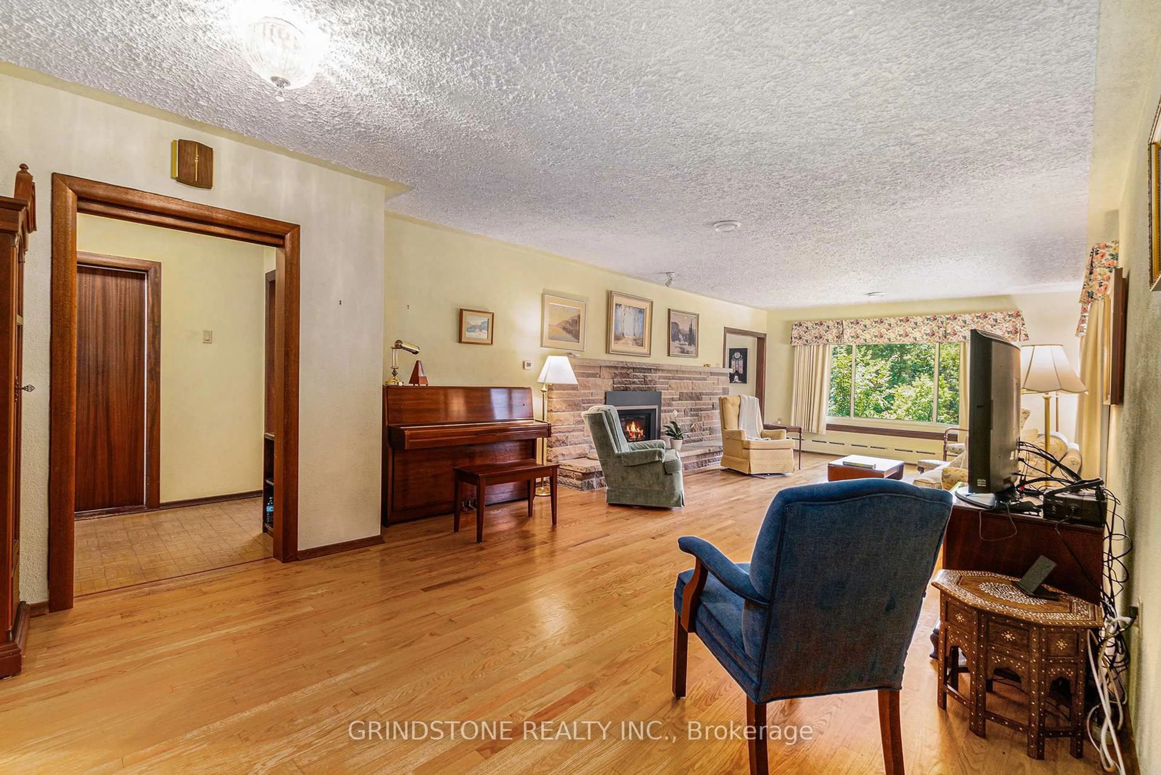Living room with furniture, unknown for 18 Eisenhower Cres, Ottawa Ontario K2J 3Z8