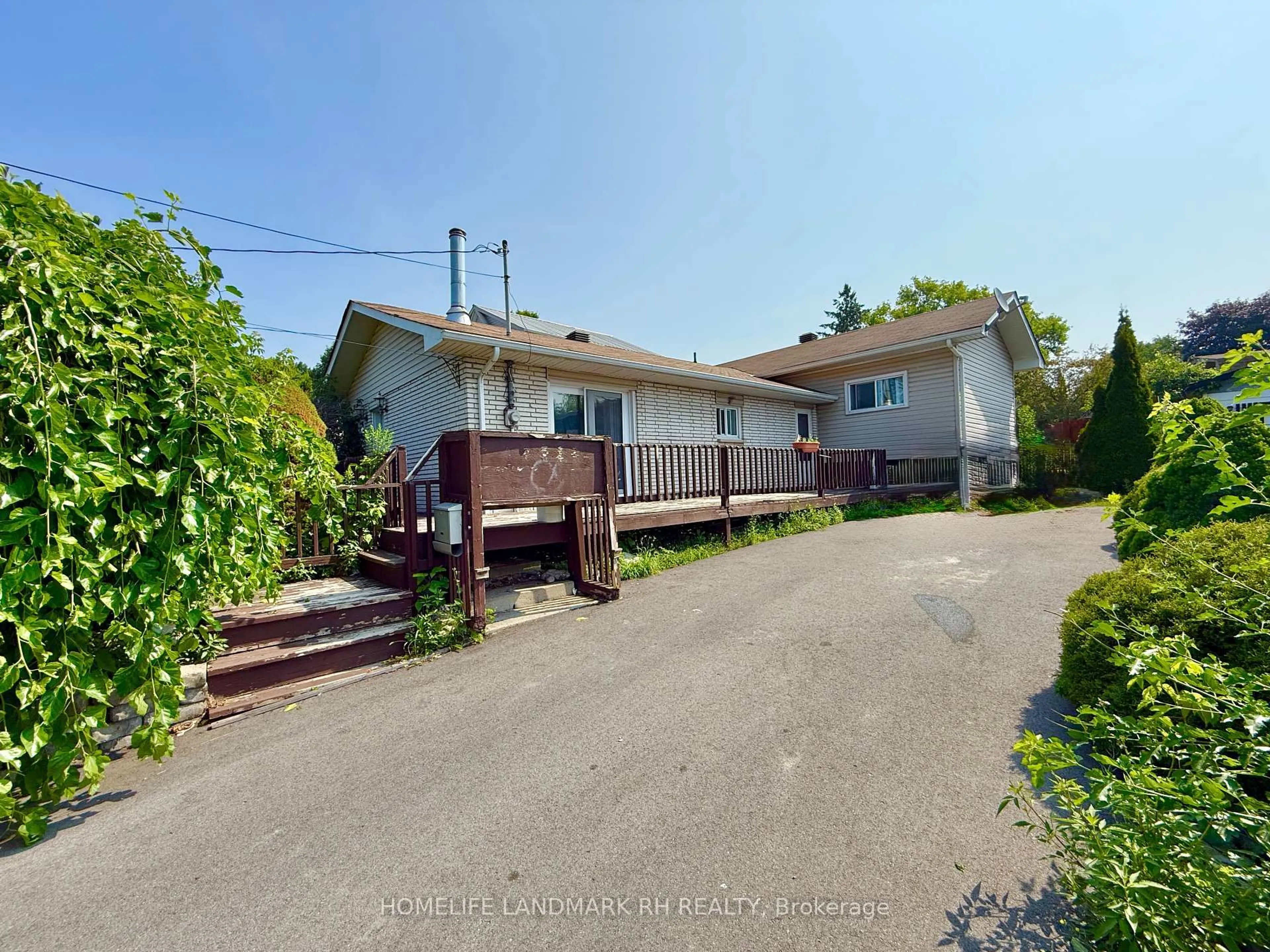 A pic from outside/outdoor area/front of a property/back of a property/a pic from drone, street for 317 Sidney St, Quinte West Ontario K8V 2V1